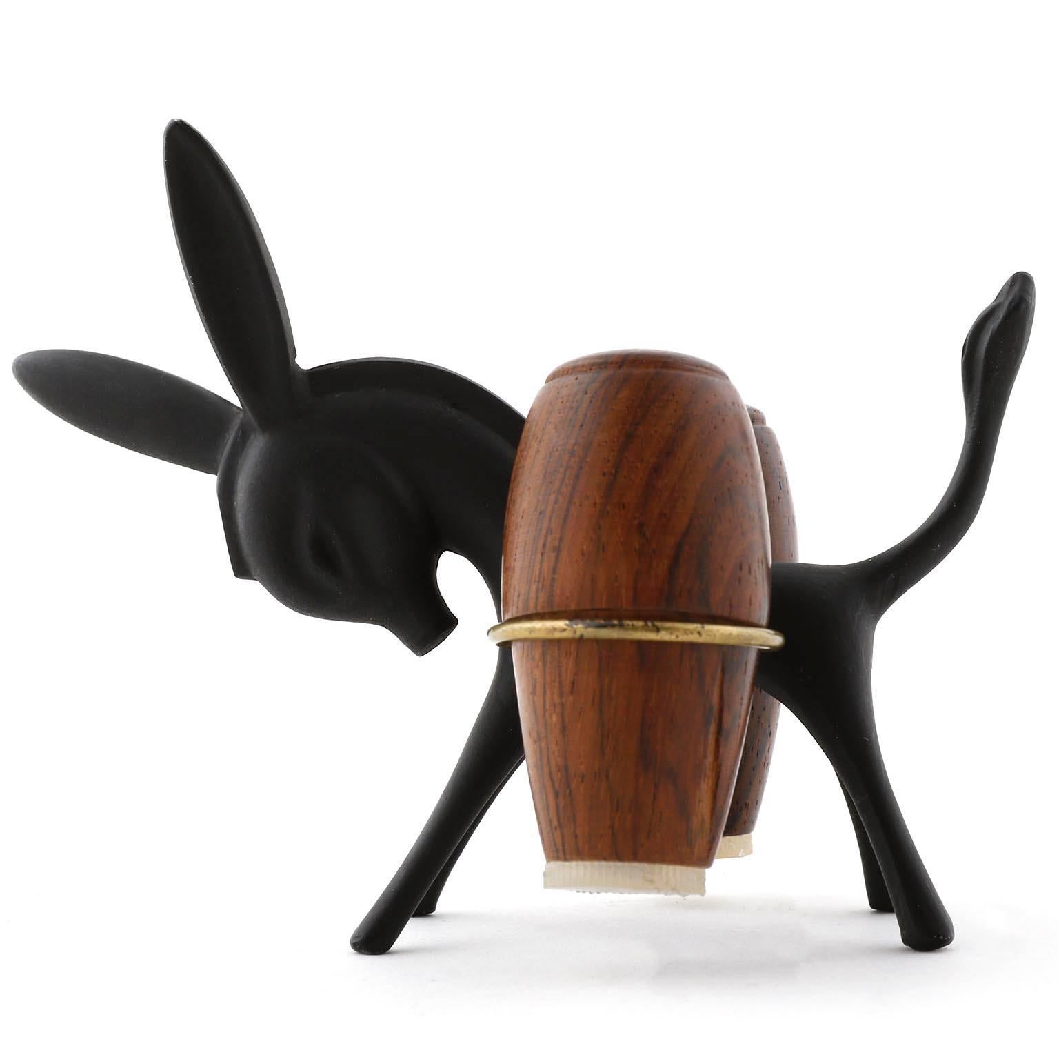 A salt and pepper donkey set designed by Walter Bosse and manufactured by Hertha Baller, Austria, Vienna, in midcentury in 1950s.
The donkey is made of blackened brass. The shakers are made of wood.
This charming piece is an eye-catcher for every