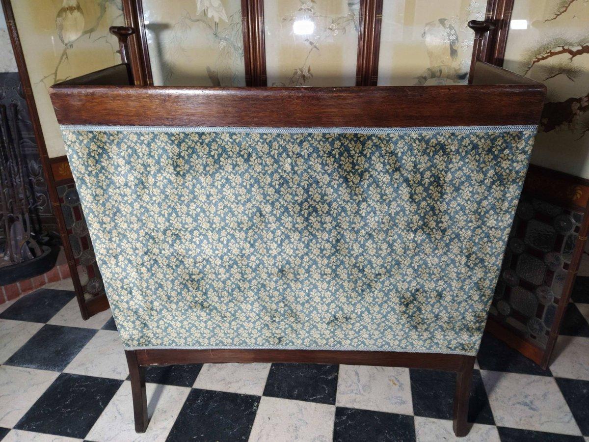 English Walter Cave, an Arts & Crafts Oak Settee with Voysey Style Uprights For Sale
