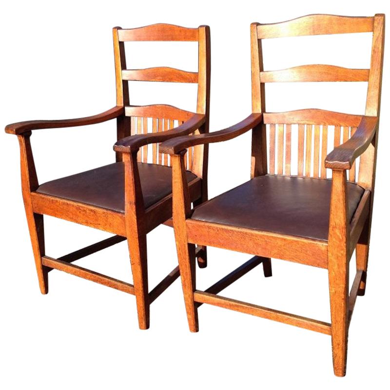 Walter Cave Attri. a Pair of Arts & Crafts Oak Armchairs with Curvaceous Backs