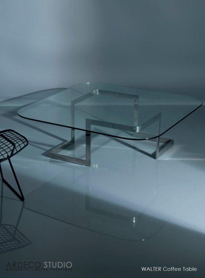Laser-cutting and bending modern technique brought to its highest point of possibilities.
Glass top and polished stainless steel base.