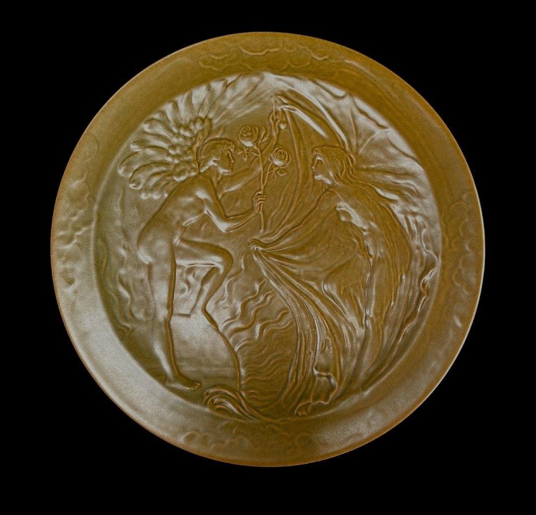 £1,450.00
 
5386


“Night and Day” a scarce and early Walter Crane design for Pilkington’s
A Plaque in a Satin Olive Glaze
This was one of Crane’s earliest designs for Pilkingtons
circa 1905
32.5cm wide
Period hanging holes to the reverse.