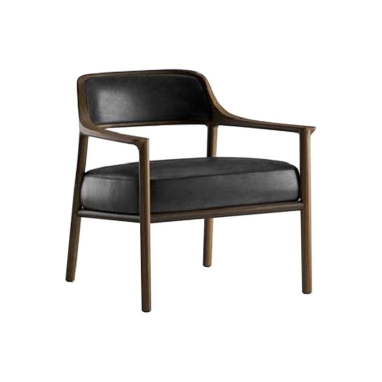 Fauteuil Molteni&C en cuir noir et bois massif par Vincent Van Duysen