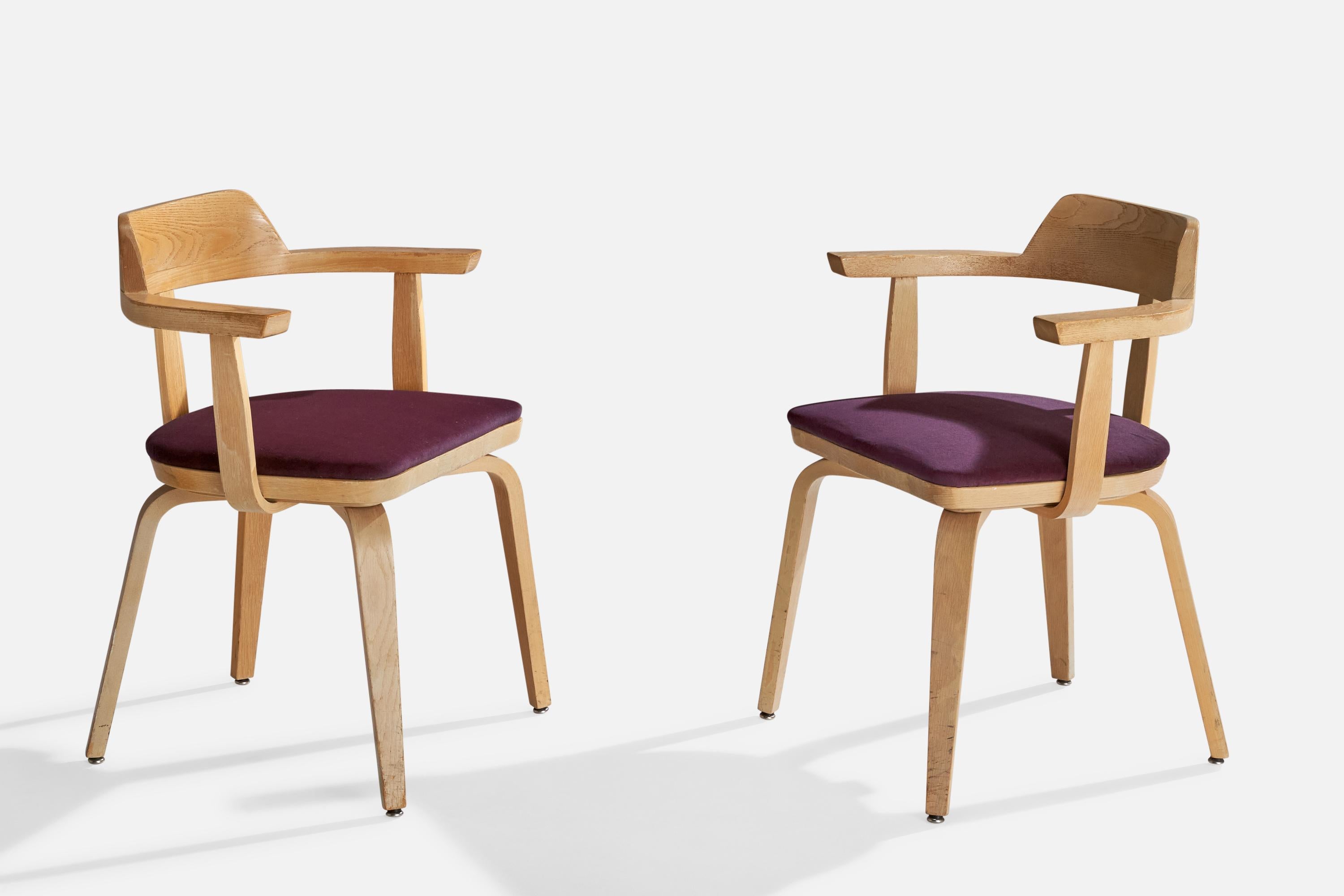 A pair of oak and purple velvet armchairs designed by Walter Gropius in 1951, produced by Thonet, Statesville, North Carolina, USA, c. 1970s.

Dimensions: 29.5” H x 24” W x 19” D

Seat height: 18.5”