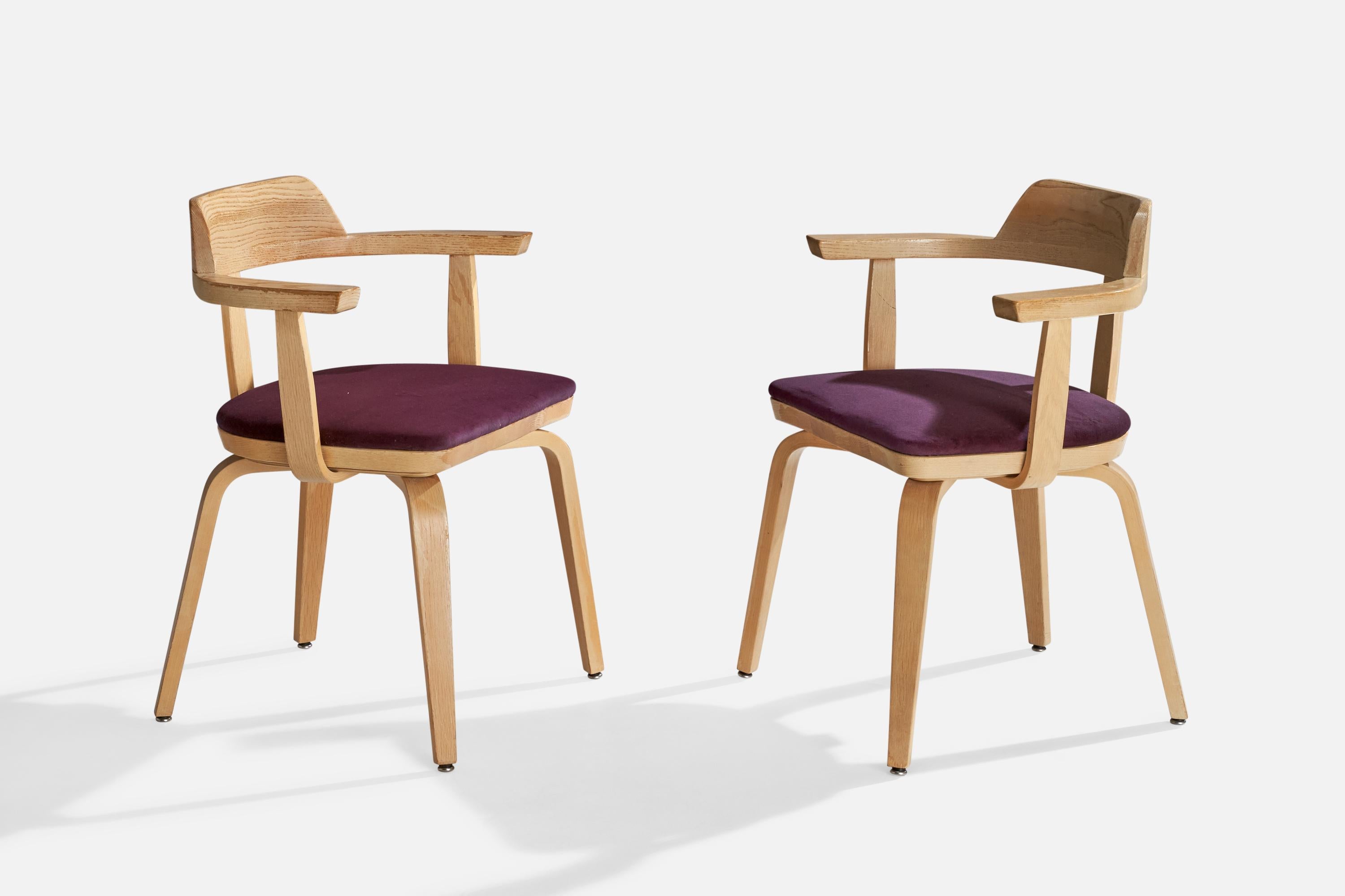 A pair of oak and purple velvet armchairs designed by Walter Gropius in 1951, produced by Thonet, Statesville, North Carolina, USA, c. 1970s.

Dimensions: 29.5” H x 24” W x 19” D

Seat height: 18.5”