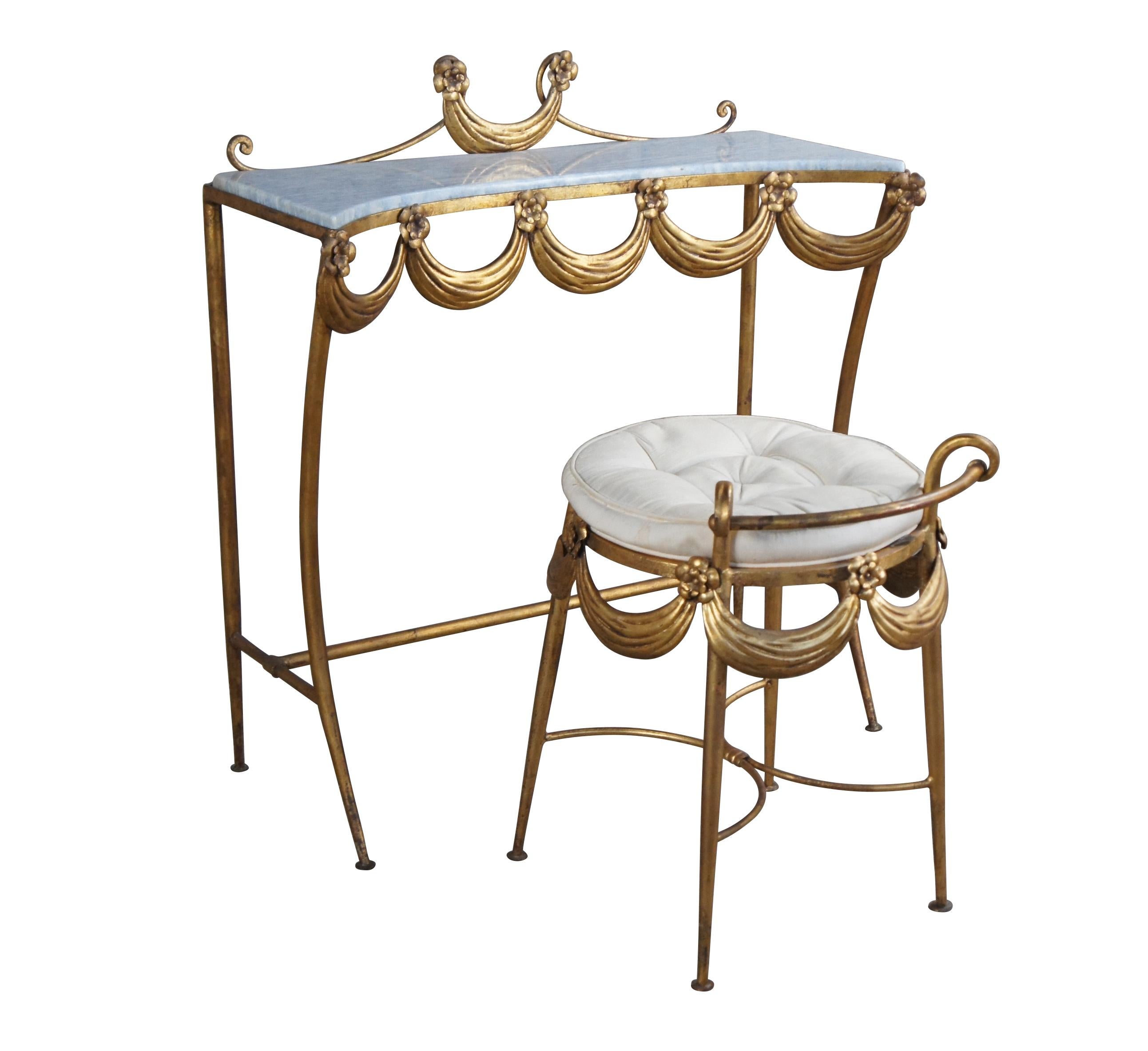 Rare The Walter Hatches mid century dressing vanity table with mirror, stool and marble top.  Made of gilded metal featuring a Neoclassical Italian Florentine motif of ribbons and flowers.  Made in Italy.

Dimensions:
31.25