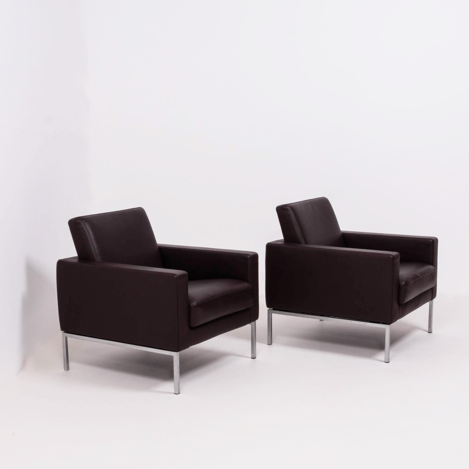 Sleek and simple, this pair of Walter Knoll armchairs have a Classic silhouette.

Featuring slim chrome frames and soft brown leather upholstery, the chairs balance a sharp aesthetic with deep, comfortable seating.

These chairs would make the