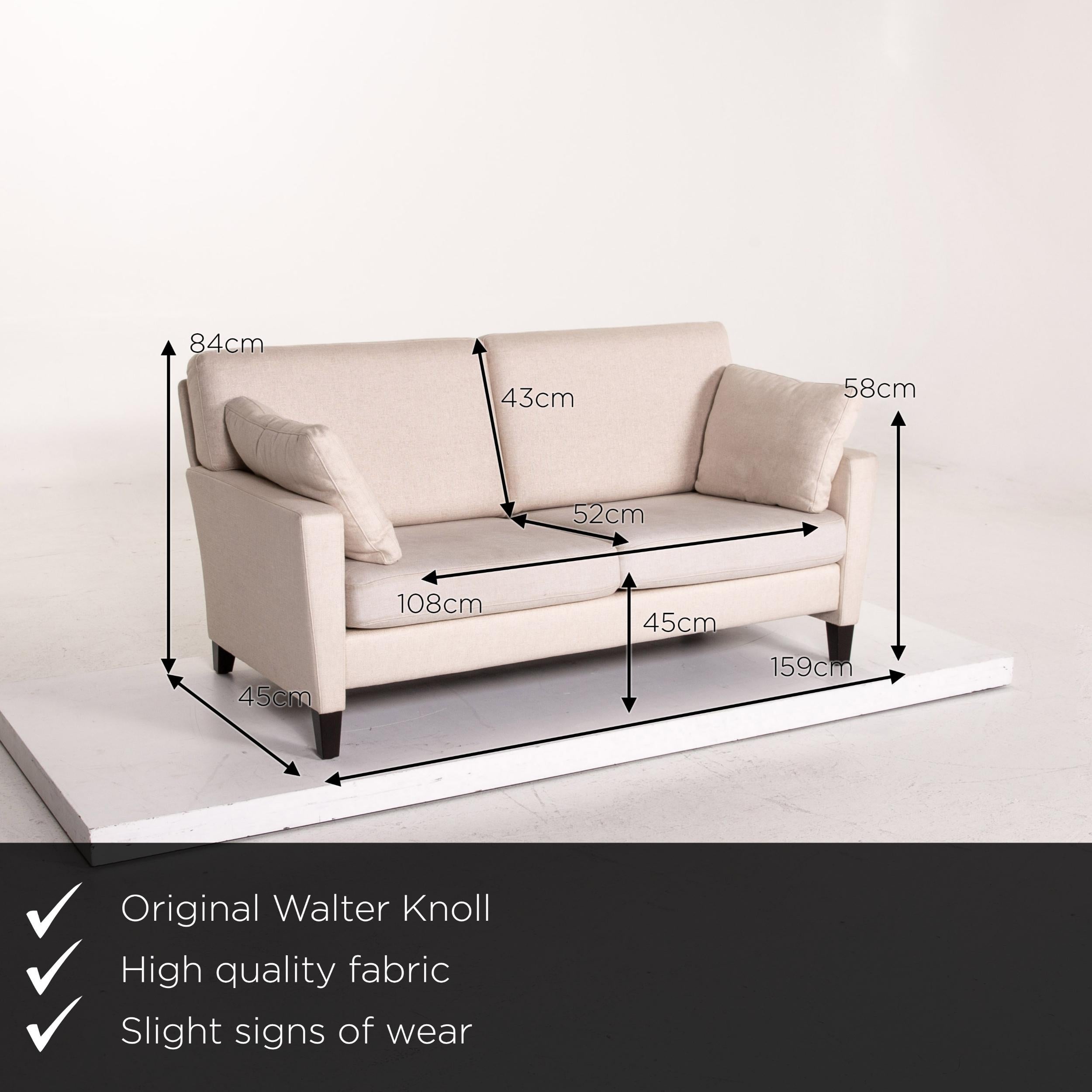 We present to you a Walter Knoll Henry fabric sofa cream two-seat couch.
 
 

 Product measurements in centimeters:
 

Depth 84
Width 159
Height 84
Seat height 45
Rest height 58
Seat depth 52
Seat width 108
Back height 43.
  