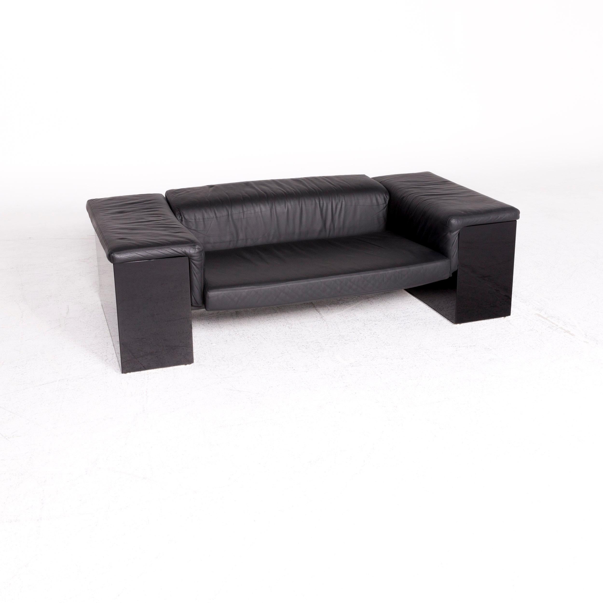 We bring to you a Walter Knoll International Brigadier leather sofa black Cini Boeri two-seat.
   
 
 Product measurements in centimeters:
 
 Depth 95
Width 181
Height 55
Seat-height 35
Rest-height 55
Seat-depth 61
Seat-width