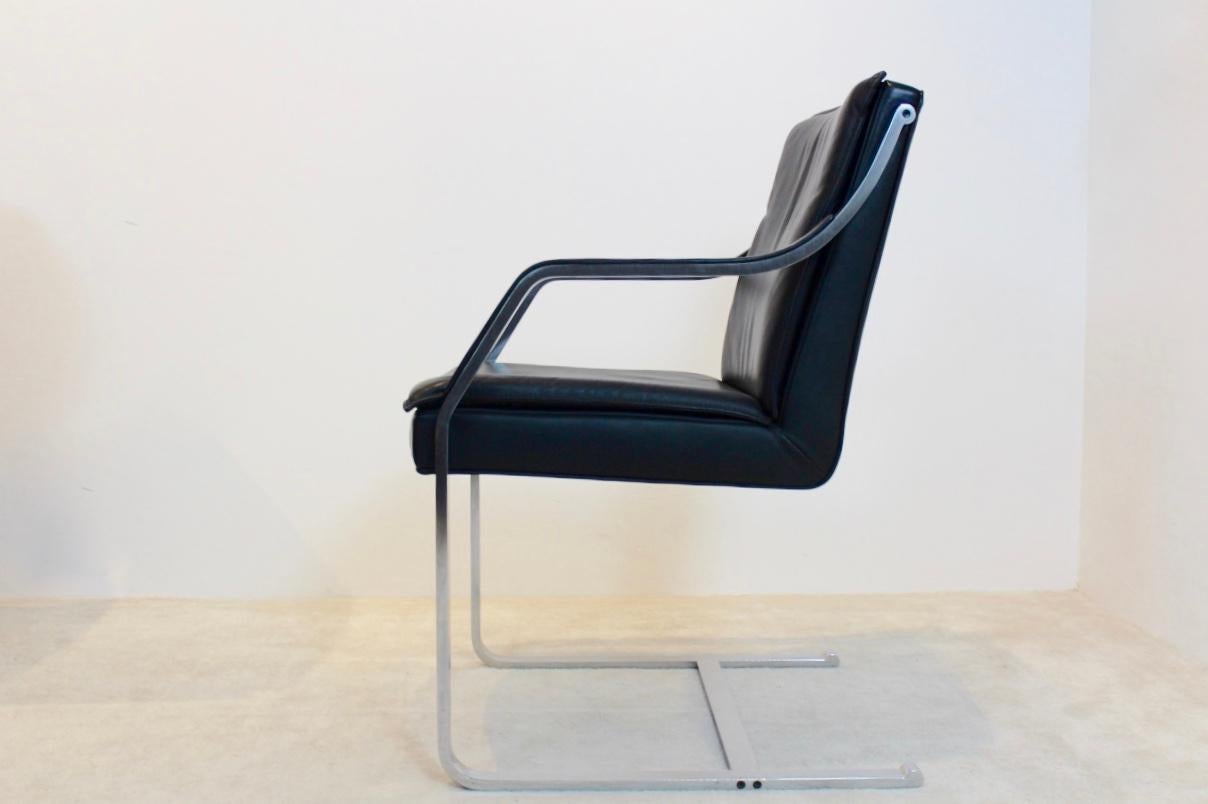 The graceful Art Collection chair is an icon with a marvellous sit. Heavy stainless steel brushed frame with classic Black Leather upholstery. This cantilever chair was designed by Rudolf B. Glatzel in the 1980s for Walter Knoll as part of the Art