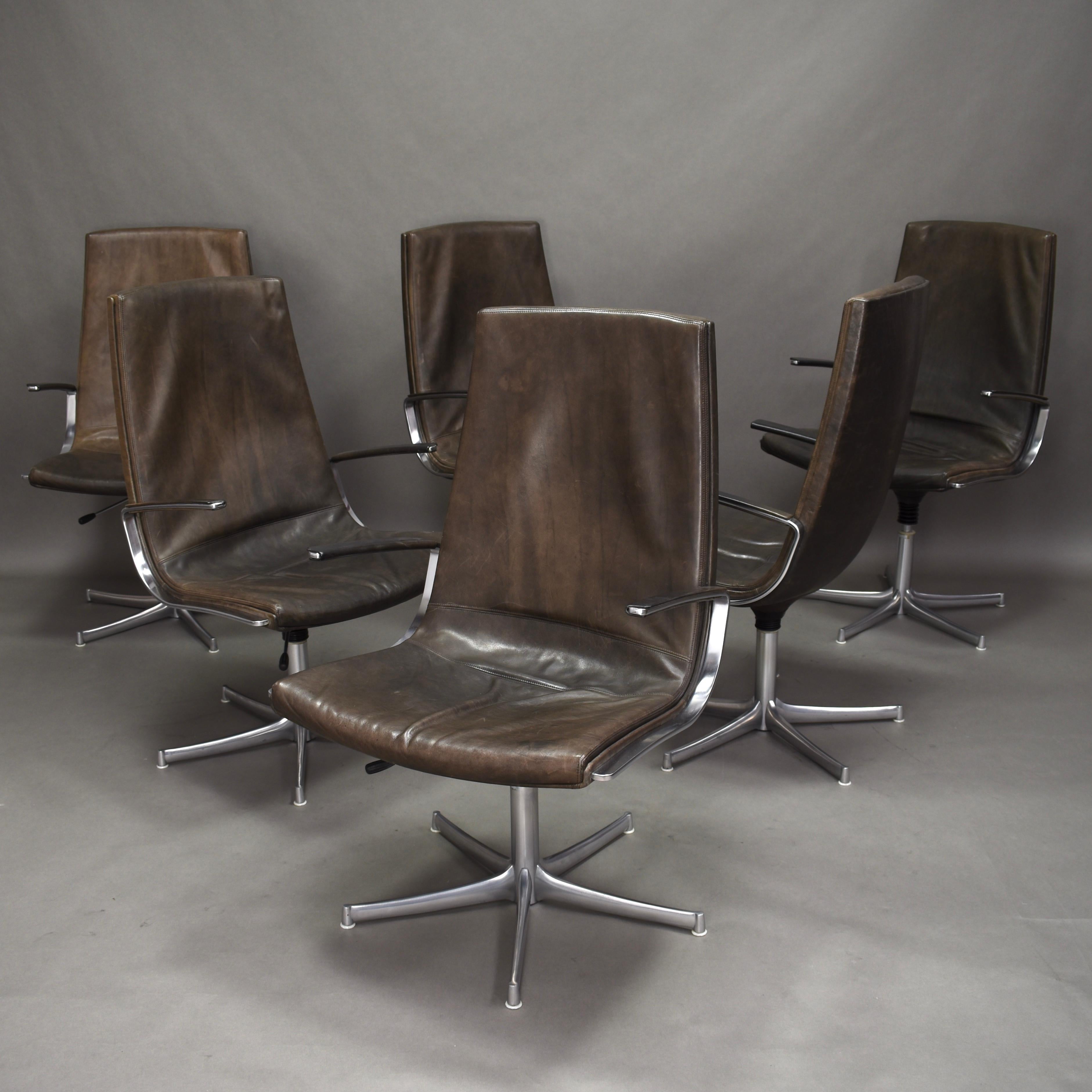 Four Walter Knoll office / conference / desk chairs – Germany, 1975. The chairs swivel 360º and are adjustable in height. Price is per piece.

In very good condition with beautiful patinated leather and thorough polished aluminum. The leather colour