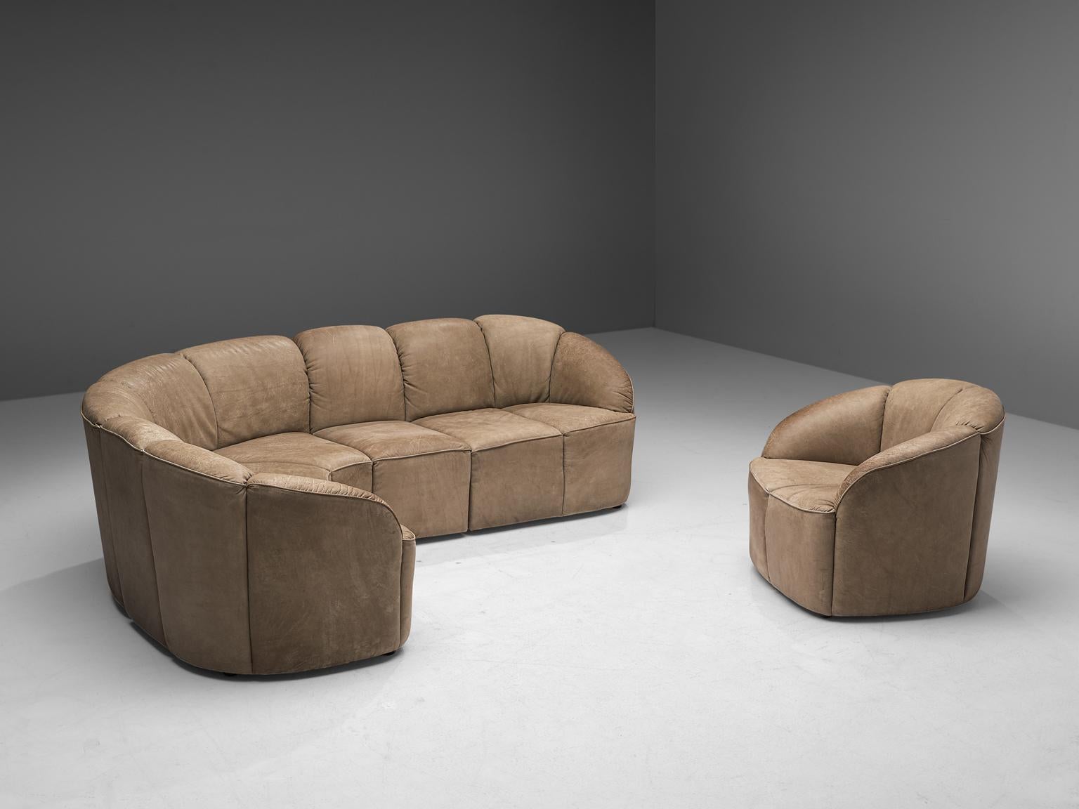 Walter Knoll, living room set, leather, Germany, 1960s

This half round sofa with lounge chair by Walter Knoll is designed in the 1960s. This model is called Piccolino. This thick, high quality set features beautiful leather upholstery. The sofa