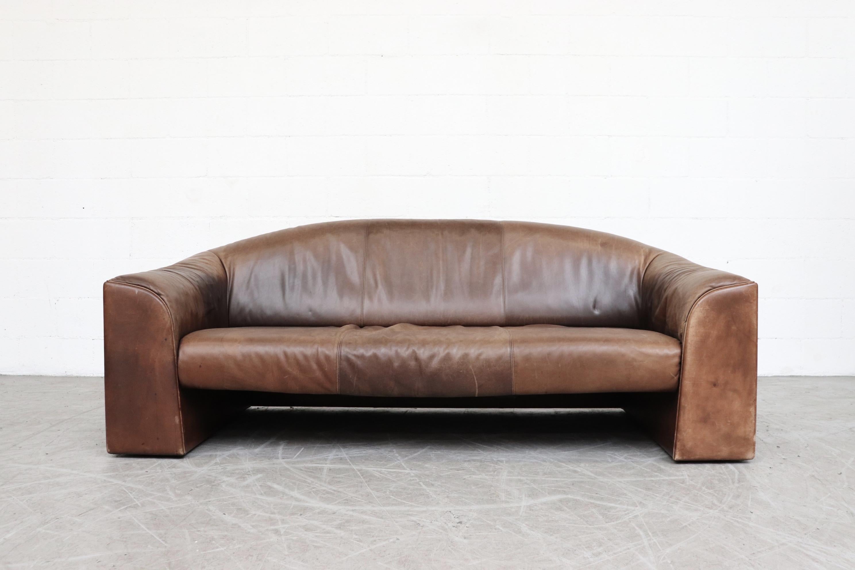 Large handsome midcentury 3-seat sofa by Walter Knoll. Thick natural brown leather with nice heavy patina. Good original condition with visible wear consistent with its age and use. Color varies slightly from photograph.