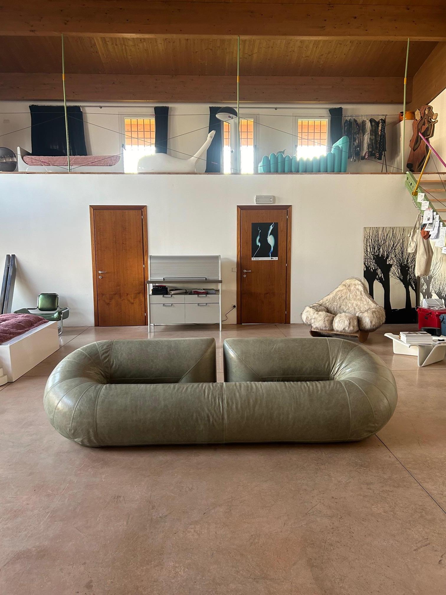 Rare Zeppelin sofa designed by Walter Leeman in the seventies for Velda. The sofa, thanks to its monumental dimensions and seamless tubular structure, makes it sculptural and predominant in any environment. The sage green leather upholstery is of