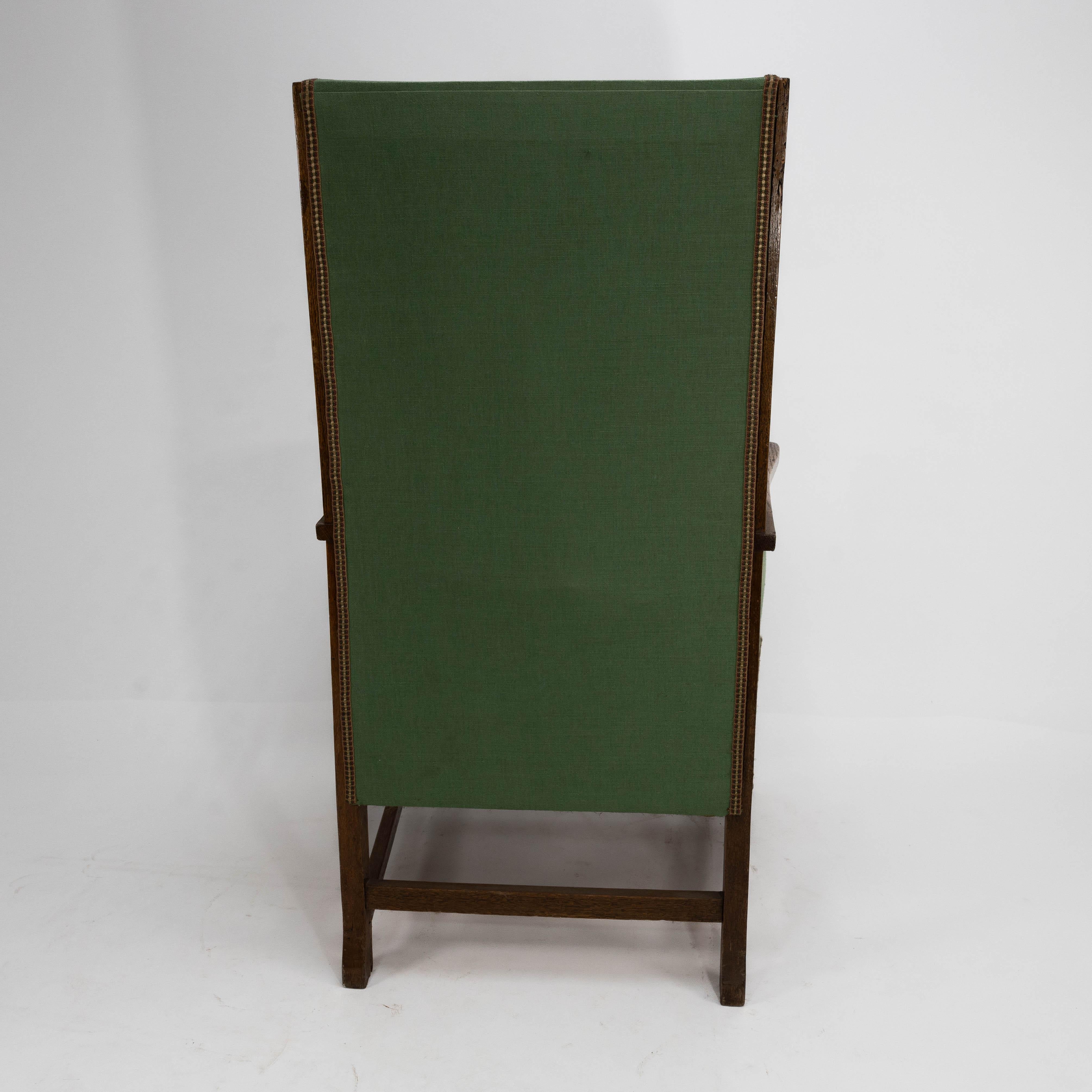 Walter Skull High Wycombe. An Arts and Crafts oak wing back upholstered armchair For Sale 5