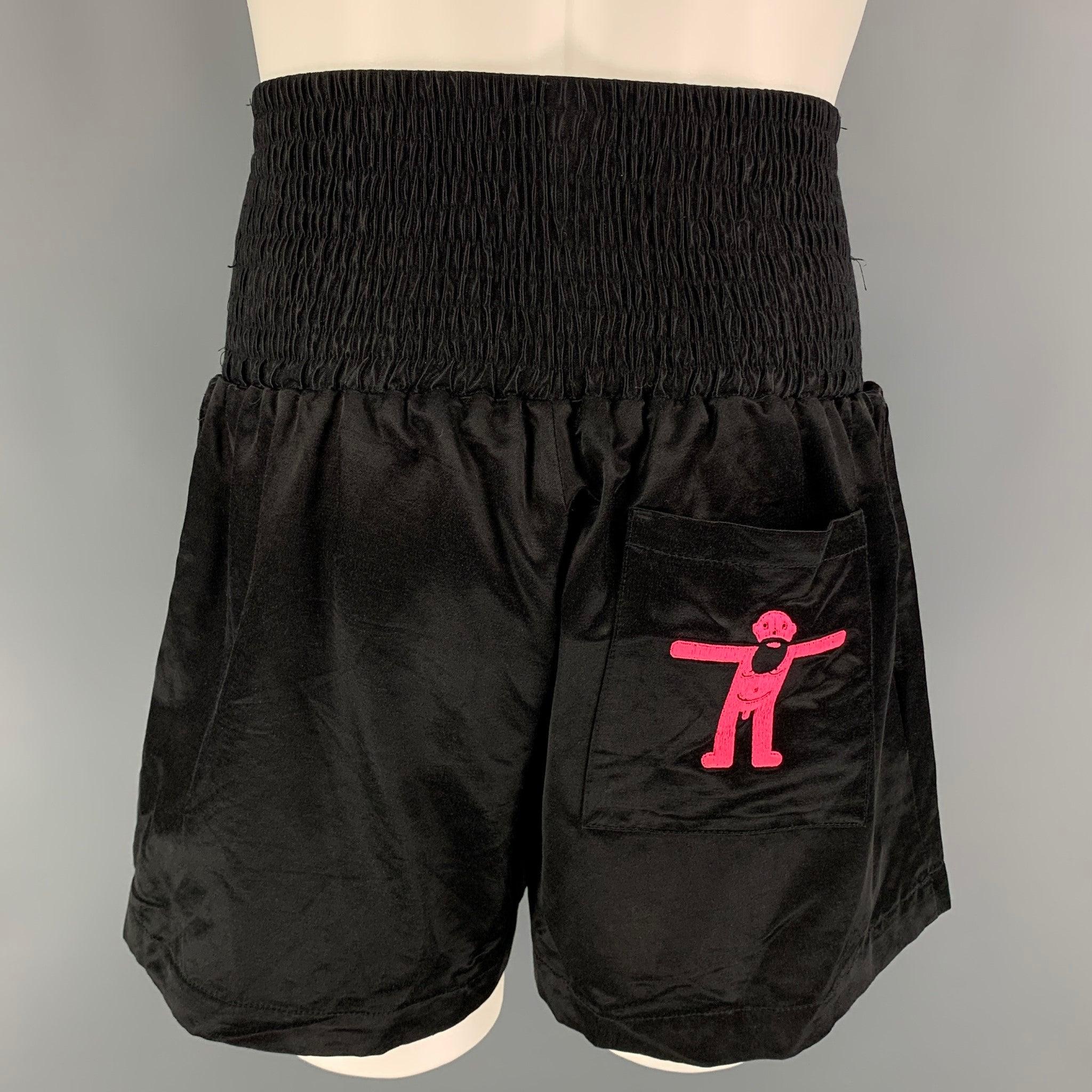 WALTER VAN BEIRENDONCK AW 19 boxer shorts comes in a black cotton featuring a high waisted corset design, back embroidered design, and slit pockets. Includes tags. Very Good Pre-Owned Condition.  

Marked:   S 

Measurements: 
  Waist: 30 inches