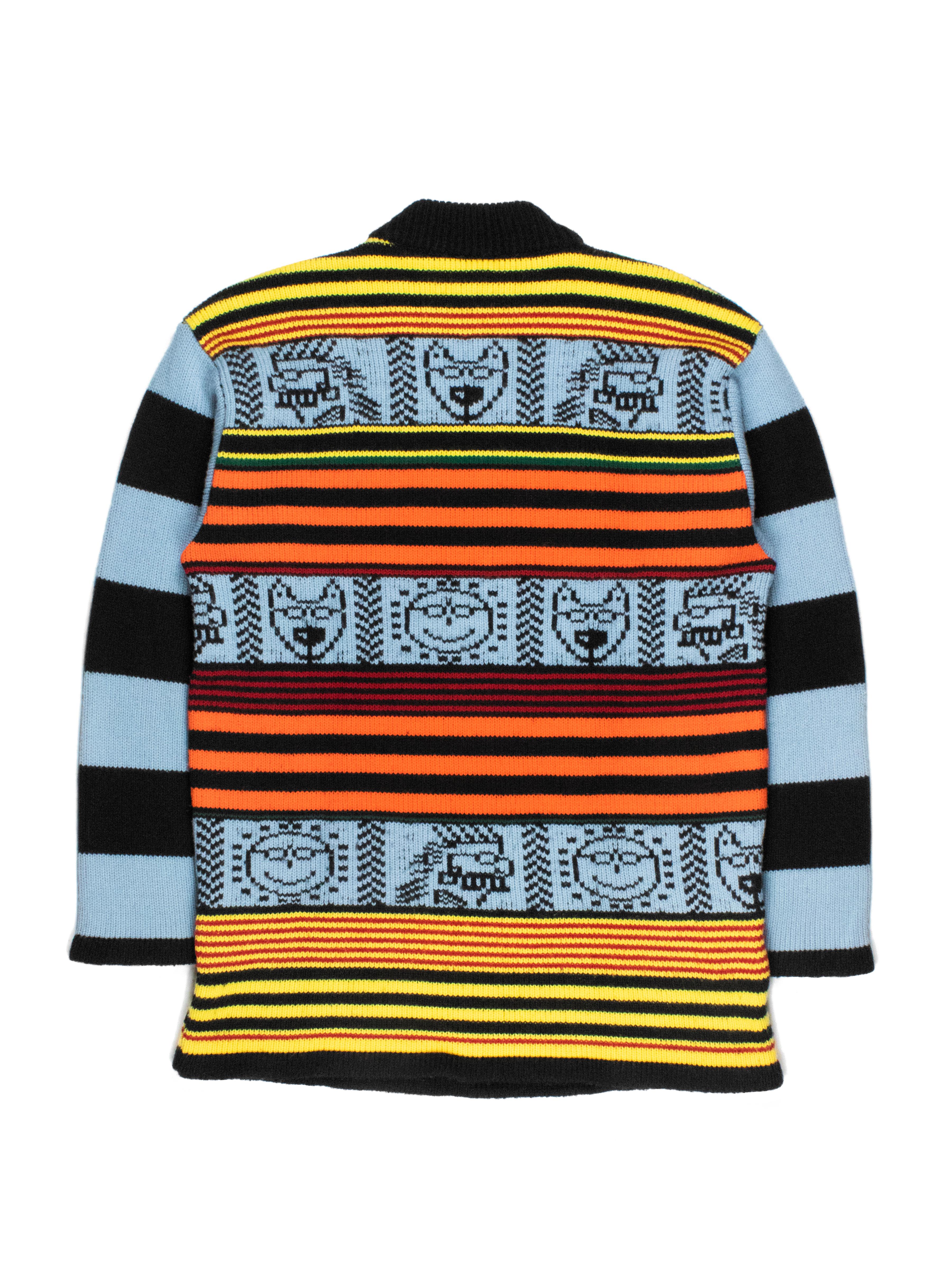 Walter’s fall 1988 collection borrowed from an eclectic blend of influences. Hand-drawn pictograms derived from ancient Aztec and Mayan paintings were a prevalent experiment, and can be seen on this sweater, channeled into the visuals of his pet dog