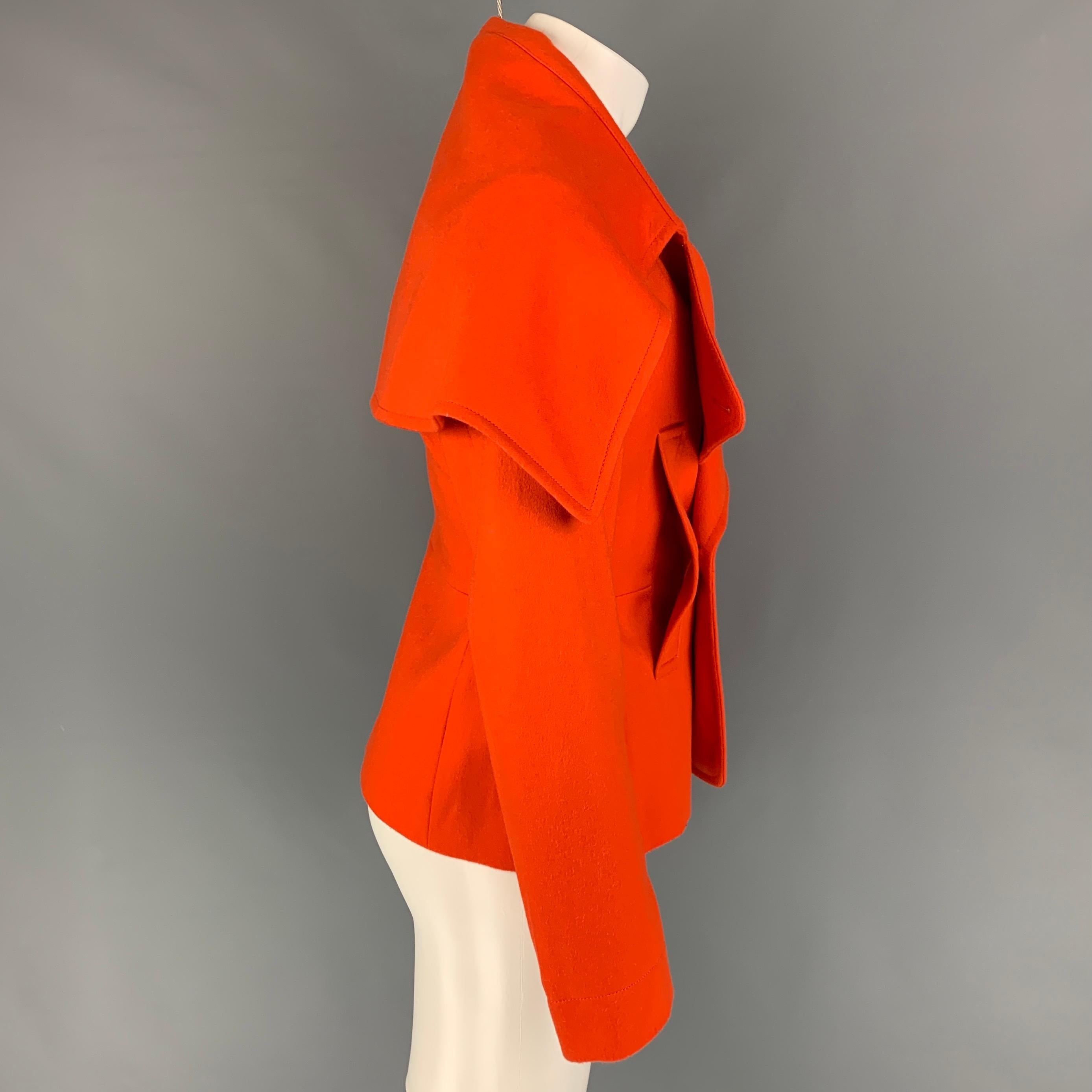 WALTER VAN BEIRENDONCK jacket comes in a orange wool with a full liner featuring a large lapel design, front pockets, and a double breasted closure. 

New With Tags. 
Marked: 46

Measurements:

Shoulder: 16 in.
Chest: 36 in.
Sleeve: 26.5 in.
Length: