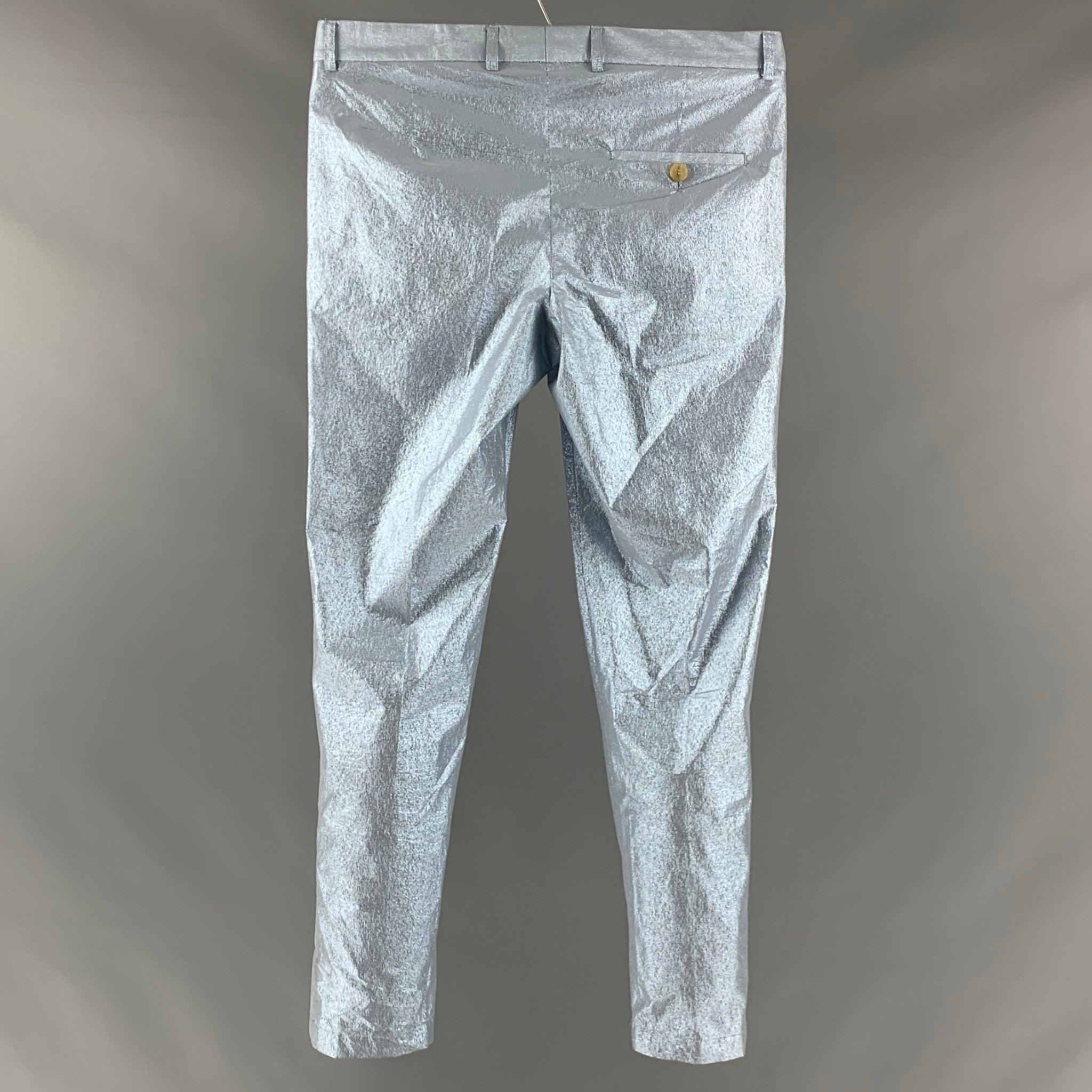 WALTER VAN BEIRENDONCK dress pants comes in a light blue polyamide blend woven material featuring a regular fit, flat front, silver shiny look, and a button zipper fly closure. Made in Italy.Very Good Pre- Owned Conditions. Minor mark at left side.