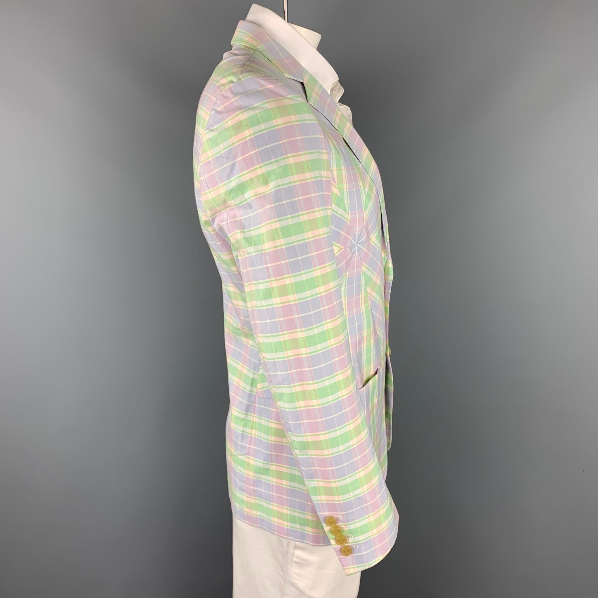 WALTER VAN BEIRENDONCK sport coat comes in a lavender & green patchwork cotton with a full liner featuring a notch lapel, front pockets, and a double button closure. Made in Belgium.

Good Pre-Owned Condition.
Marked: 52

Measurements:

Shoulder: 18