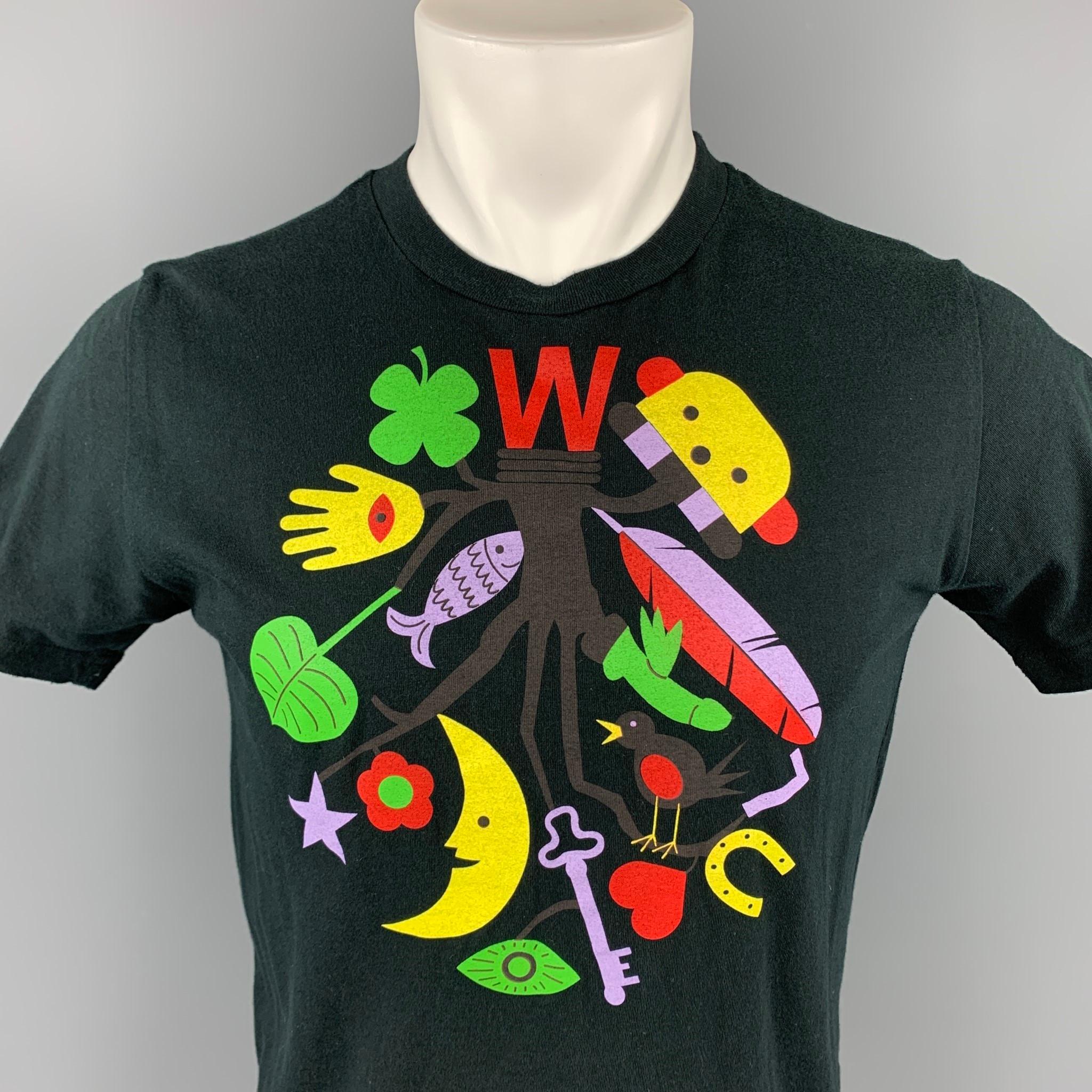WALTER VAN BEIRENDONCK t-shirt comes in a black cotton with a front graphic design featuring a crew-neck. Made in Italy.

Very Good Pre-Owned Condition.
Marked: M

Measurements:

Shoulder: 17.5 in.
Chest: 38 in.
Sleeve: 8 in.
Length: 24.5 in. 