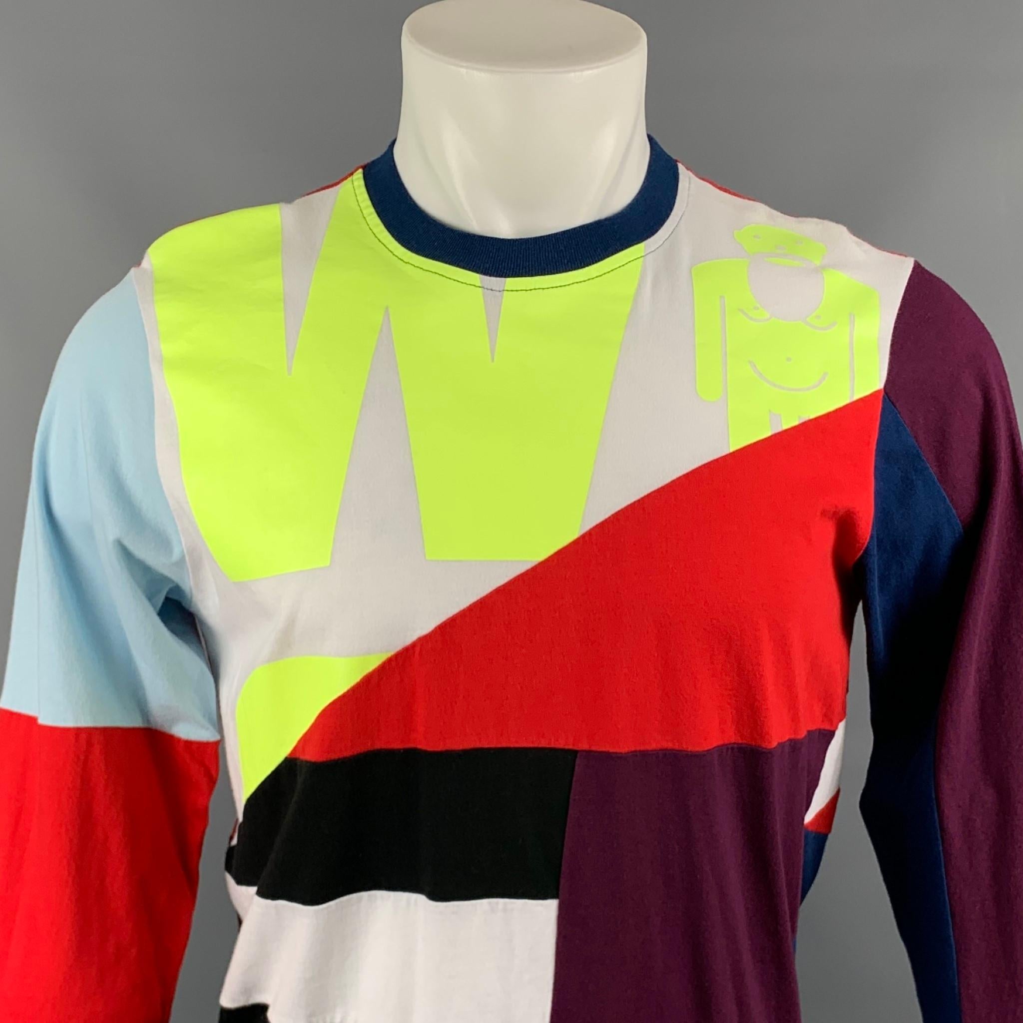 WALTER VAN BEIRENDONCK t-shirt comes in a multi-color patchwork cotton featuring a front graphic, long sleeves, and a crew-neck. Made in Italy.

Very Good Pre-Owned Condition.
Marked: S

Measurements:

Shoulder: 17 in. 
Chest: 38 in. 
Sleeve: 27.5