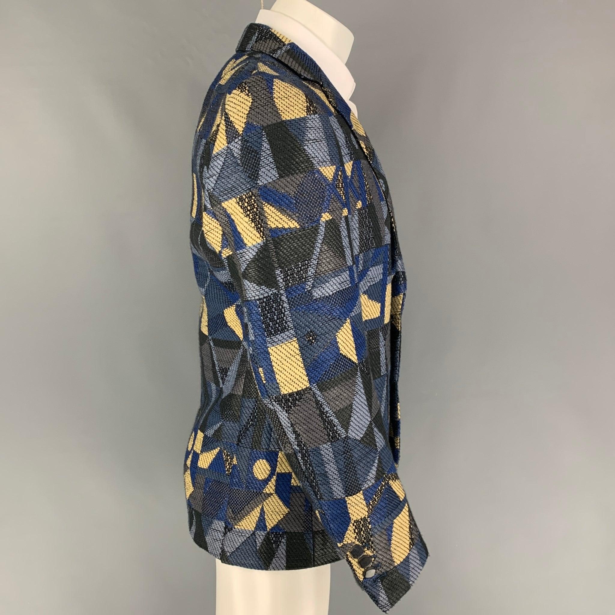 WALTER VAN BEIRENDONCK SS 14 sport coat comes in a multi-color woven cotton / acrylic with a half liner featuring a notch lapel, flap pockets, and a double button closure. Made in Belgium.Excellent
Pre-Owned Condition. 

Marked:   52 

Measurements: