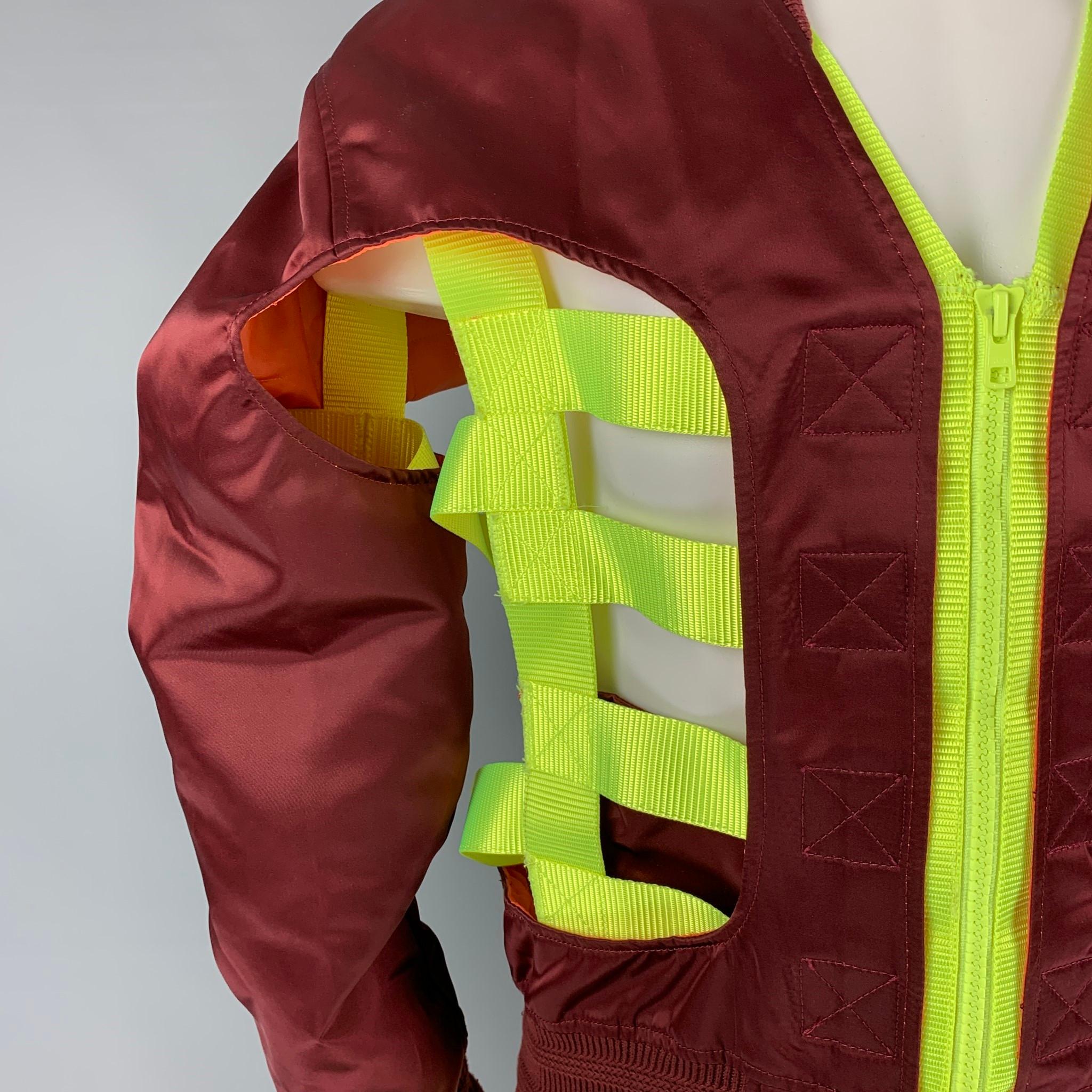WALTER VAN BEIRENDONCK SS 19 'Wild is The Wind Collection' Skeleton Bomber jacket comes in a burgundy polyester featuring a regular fit, neon cut out 