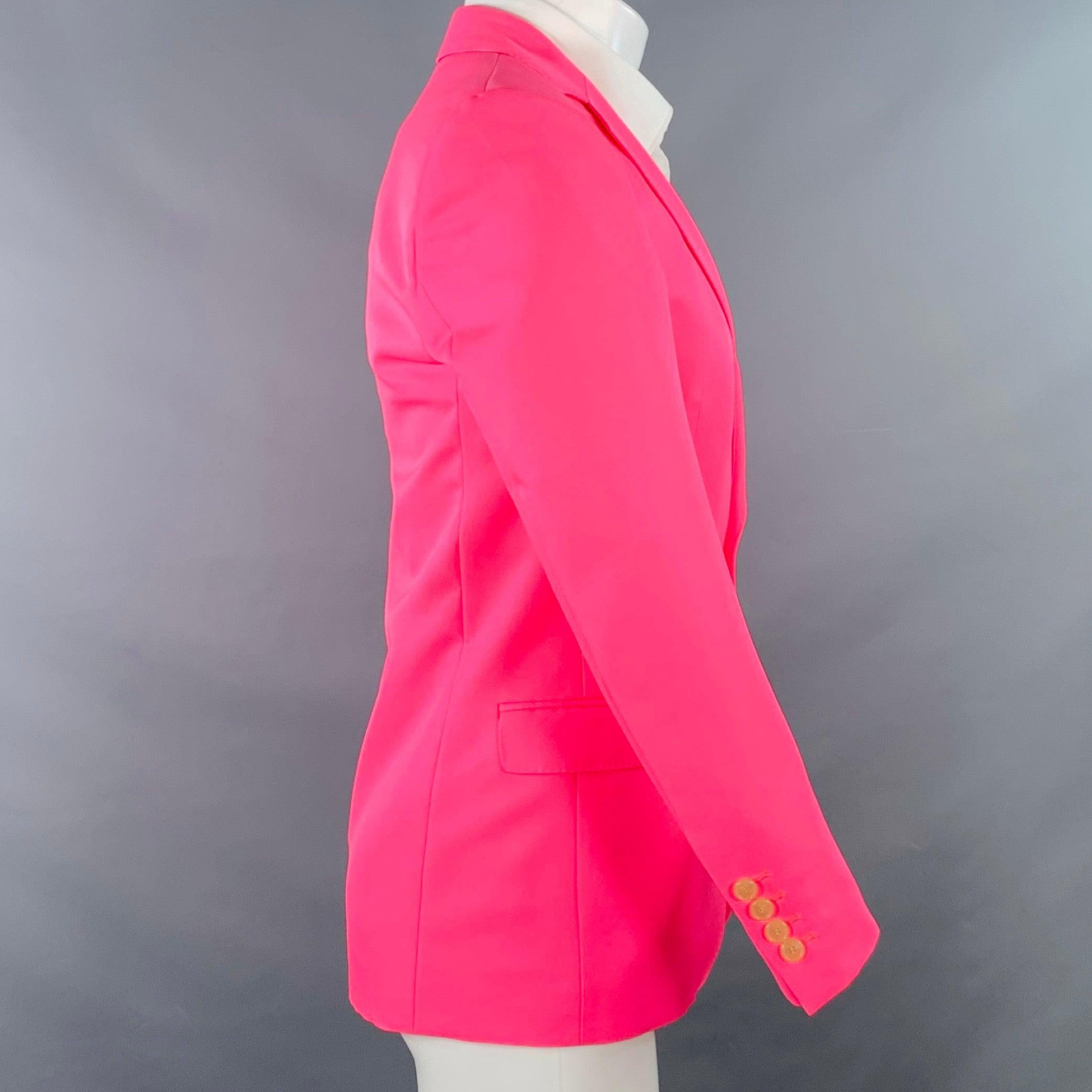 WALTER VAN BEIRENDONCK sport coat
in a neon pink polyester twill featuring a notch lapel, ventless back, and double button closure. Note: this garment has been professionally altered, please double check measurements.Excellent Pre-Owned Condition.