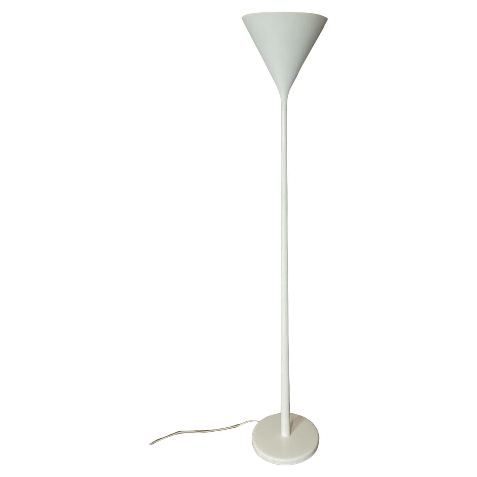 Excellent white enamel torchiere floor lamp from Nessen Studio and design by Walter Von Nessen. A few nicks to the base that will be touched up. Rewired. 