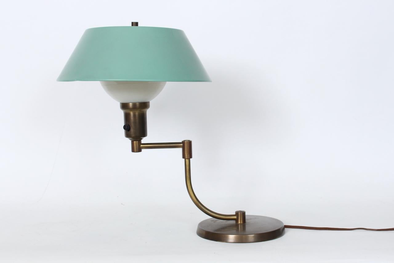 Machine Age Walter Von Nessen Style Brass Swing Arm Desk Lamp with Pale Green Shade, 1940's For Sale