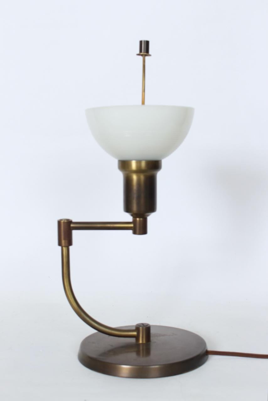 Milk Glass Walter Von Nessen Style Brass Swing Arm Desk Lamp with Pale Green Shade, 1940's For Sale