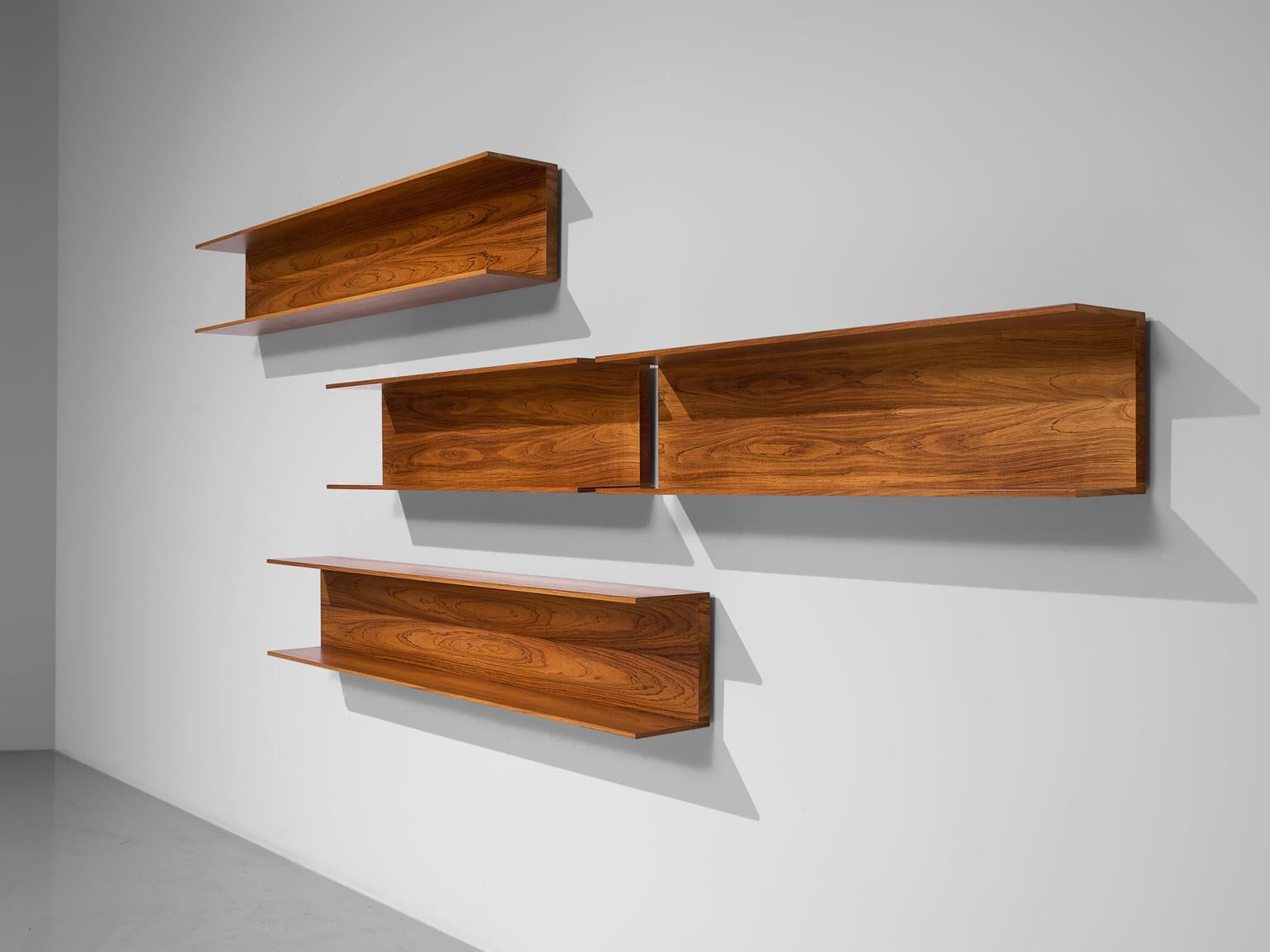 Walter Wirz for Wilhelm Renz, wall shelves, rosewood, Germany, 1965.

These rosewood wall shelves are designed by Walter Wirz for the German company Wilhelm Renz. The shelves, by now a true midcentury design classic, are both well-made and durable