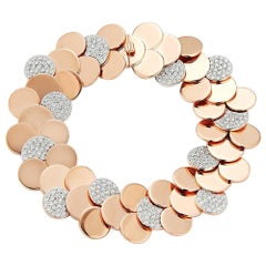 Walters Faith
s 18 Karat Rose Gold and Diamond Circular Disc Bracelet