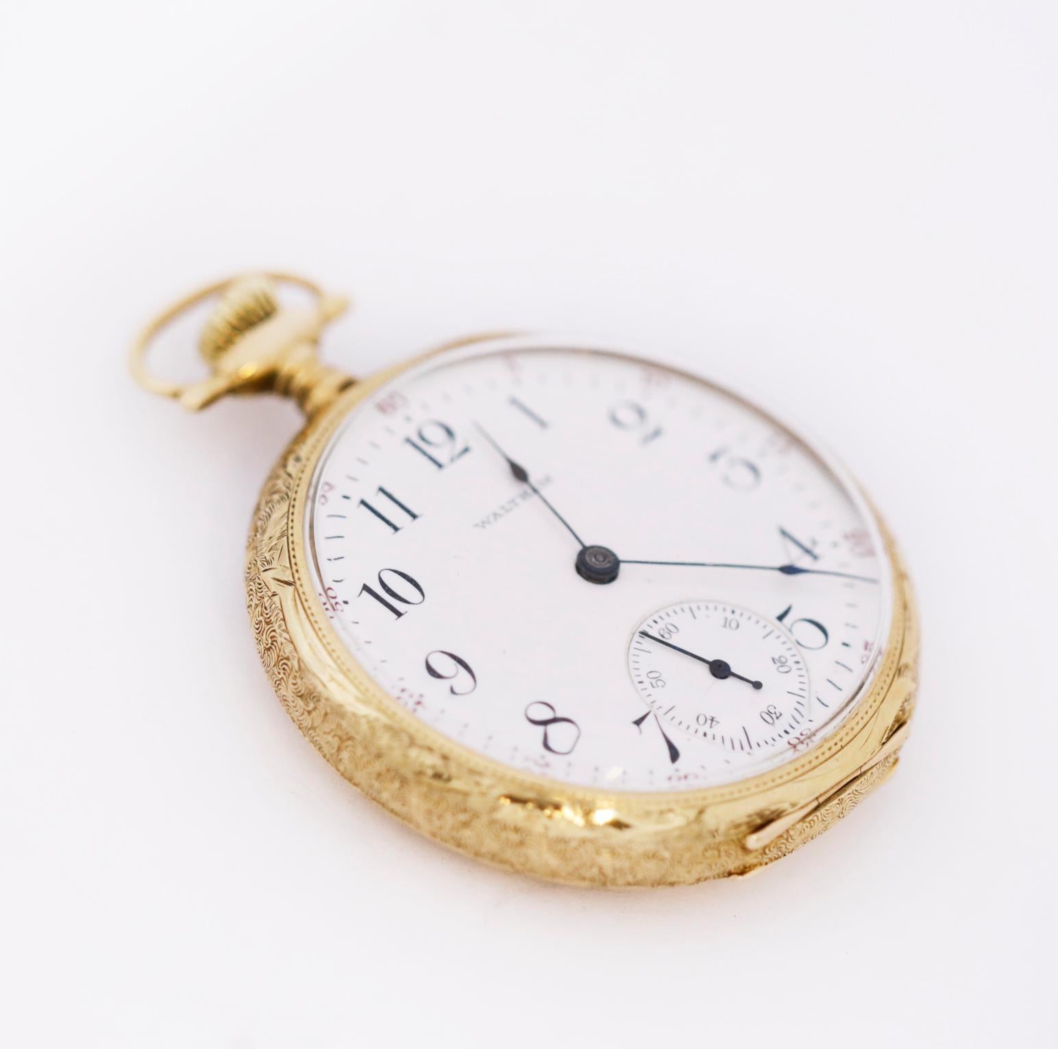 Beautiful Antique Waltham Pocket Watch
14k Yellow Gold Case 
Intricate Flower Design on Case 
White Dial 
Dark Cobalt Blue Hands 
Dedicated Second Sub-Dial 
Black Arabic Numerals 
Manual Winding Movement 
Grade No. 620
Size 16S
15 jewels 
Church