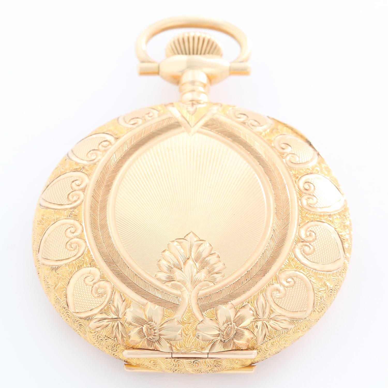 Waltham 14K Yellow Gold 16S Model 1899 Manual Pocket Watch - Manual. 14K Yellow gold with engraving detail and gold cuvette (50 mm ). White enamel with second subdial at 6 o'clock. Pre-owned with custom box. Total weight 99.7 grams. Unused, never