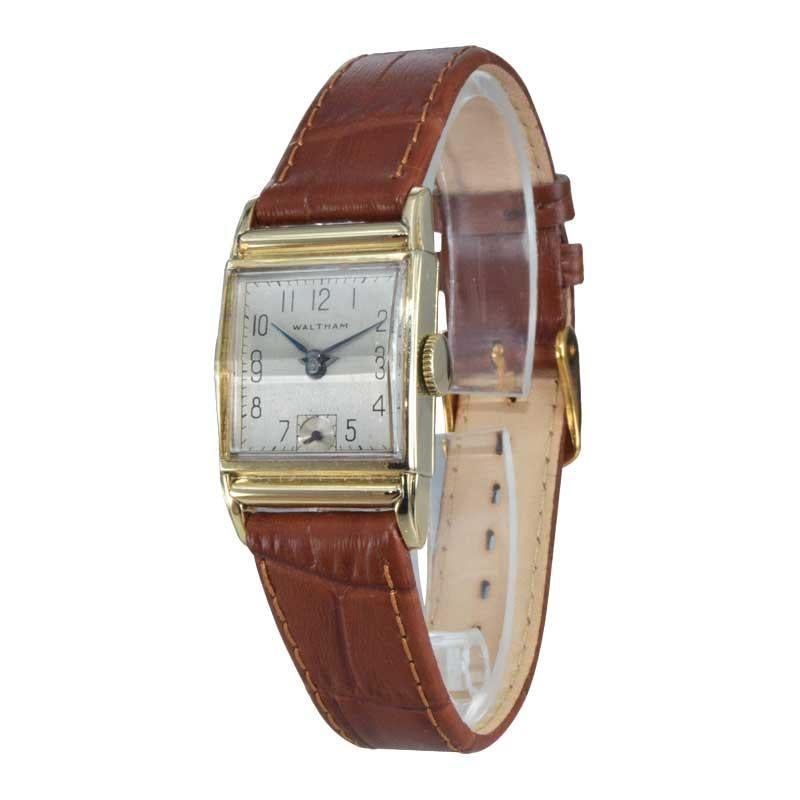 FACTORY / HOUSE: Waltham Watch Company
STYLE / REFERENCE: Tank Style 
METAL / MATERIAL: 14kt Gold Filled
CIRCA / YEAR: 1940's
DIMENSIONS / SIZE: 34mm X 21mm
MOVEMENT / CALIBER: Manual Winding / 17 Jewels 
DIAL / HANDS: Original Silvered with Arabic