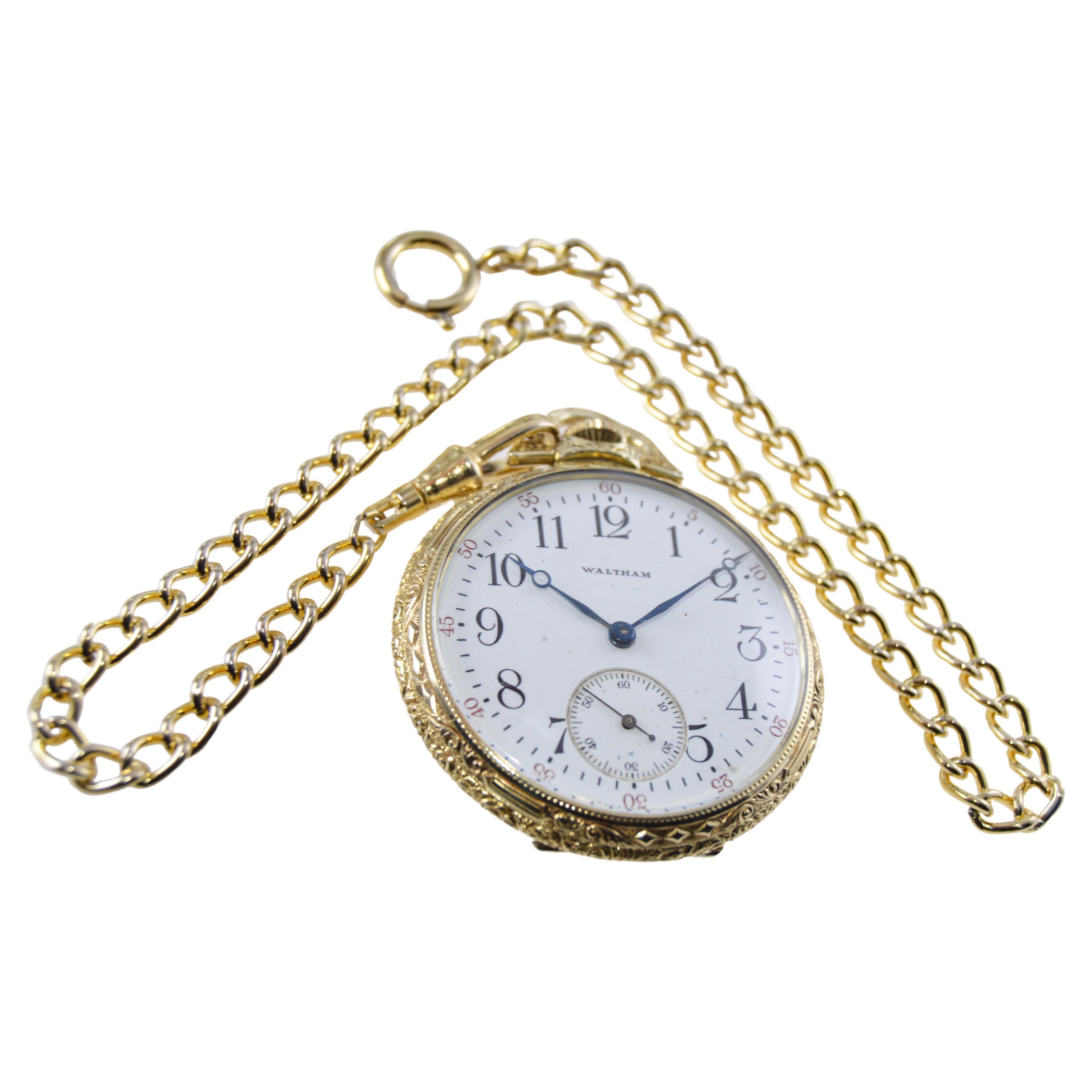 FACTORY / HOUSE: Waltham Watch Company
STYLE / REFERENCE: Open Faced Hand Engraved Pocket Watch
METAL / MATERIAL: Yellow Gold Filled
CIRCA / YEAR: 1908 
DIMENSIONS / SIZE: Diameter 45mm
MOVEMENT / CALIBER: Manual Winding / 17 Jewels / 12 Size
DIAL /