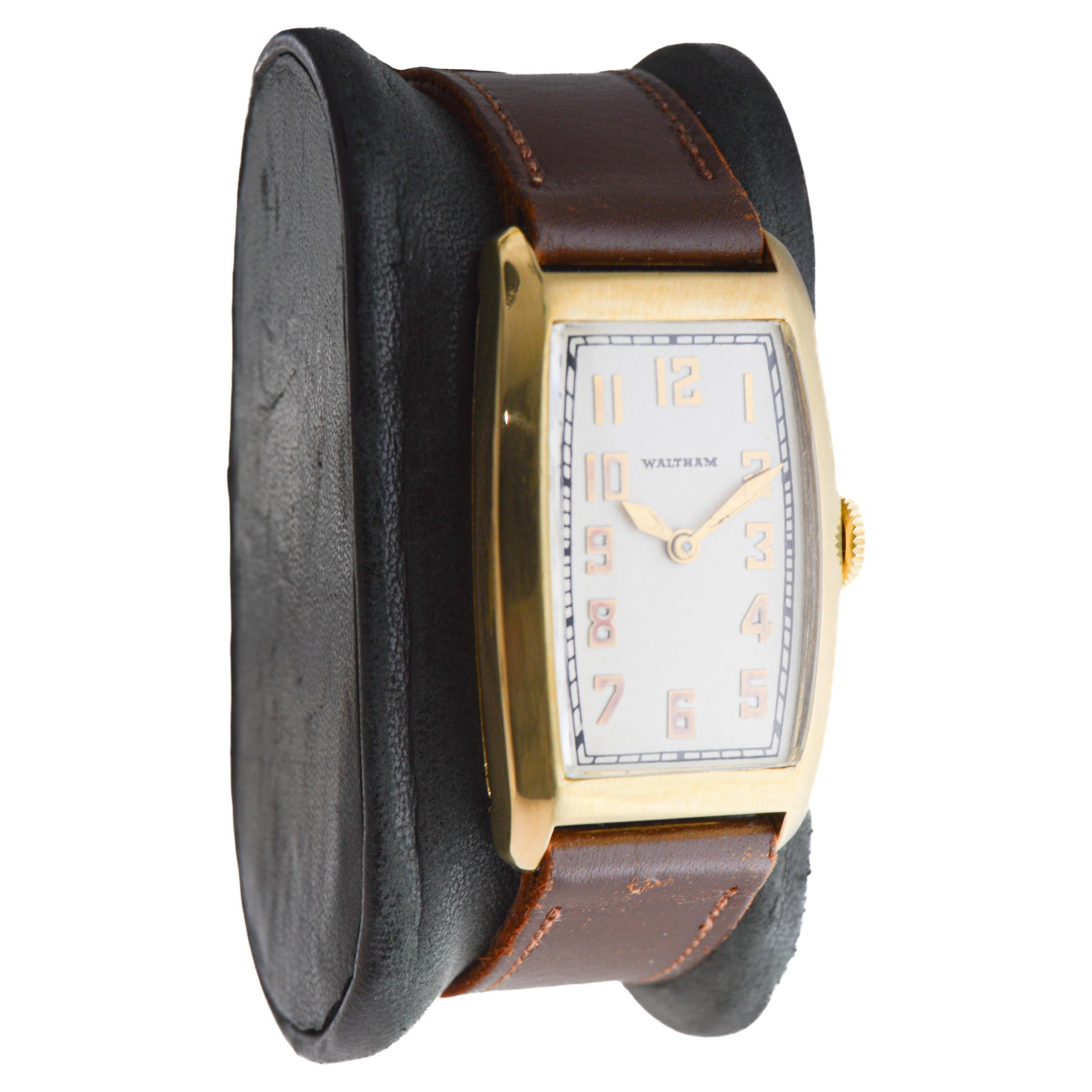 FACTORY / HOUSE: Waltham Watch Company
STYLE / REFERENCE: Art deco / Tonneau Shape
METAL / MATERIAL: Gold Filled
CIRCA / YEAR: 1934
DIMENSIONS / SIZE: Length 41mm X Width 24mm
MOVEMENT / CALIBER: Manual Winding / 17 Jewels / Caliber 
DIAL / HANDS: