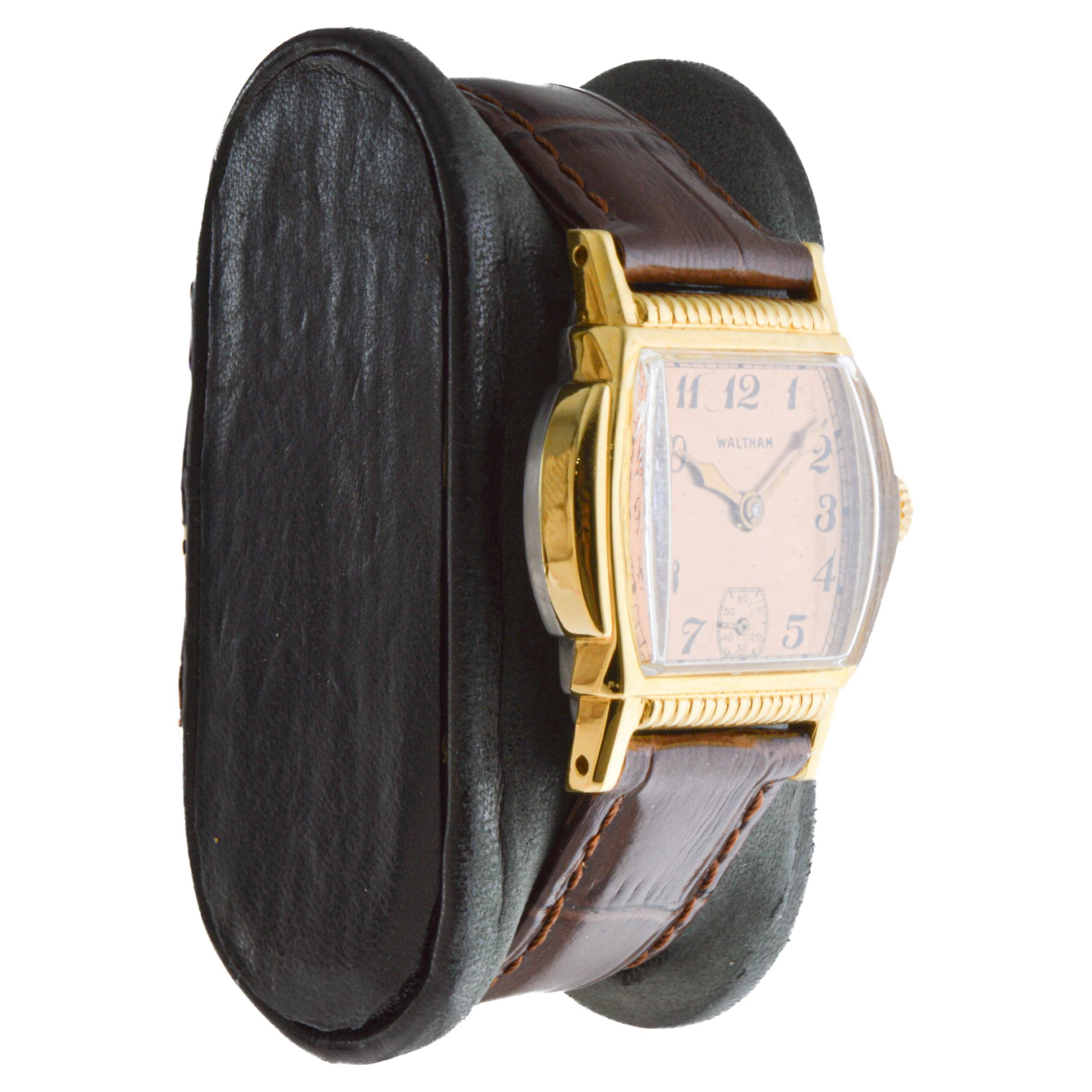 FACTORY / HOUSE: Waltham Watch Company
STYLE / REFERENCE: Art Deco / Tortue Shape
METAL / MATERIAL: Yellow Gold Filled
CIRCA / YEAR: 1934
DIMENSIONS / SIZE: Length 36mm X Width 27mm
MOVEMENT / CALIBER: Manual Winding / 9 Jewels
DIAL / HANDS: Copper