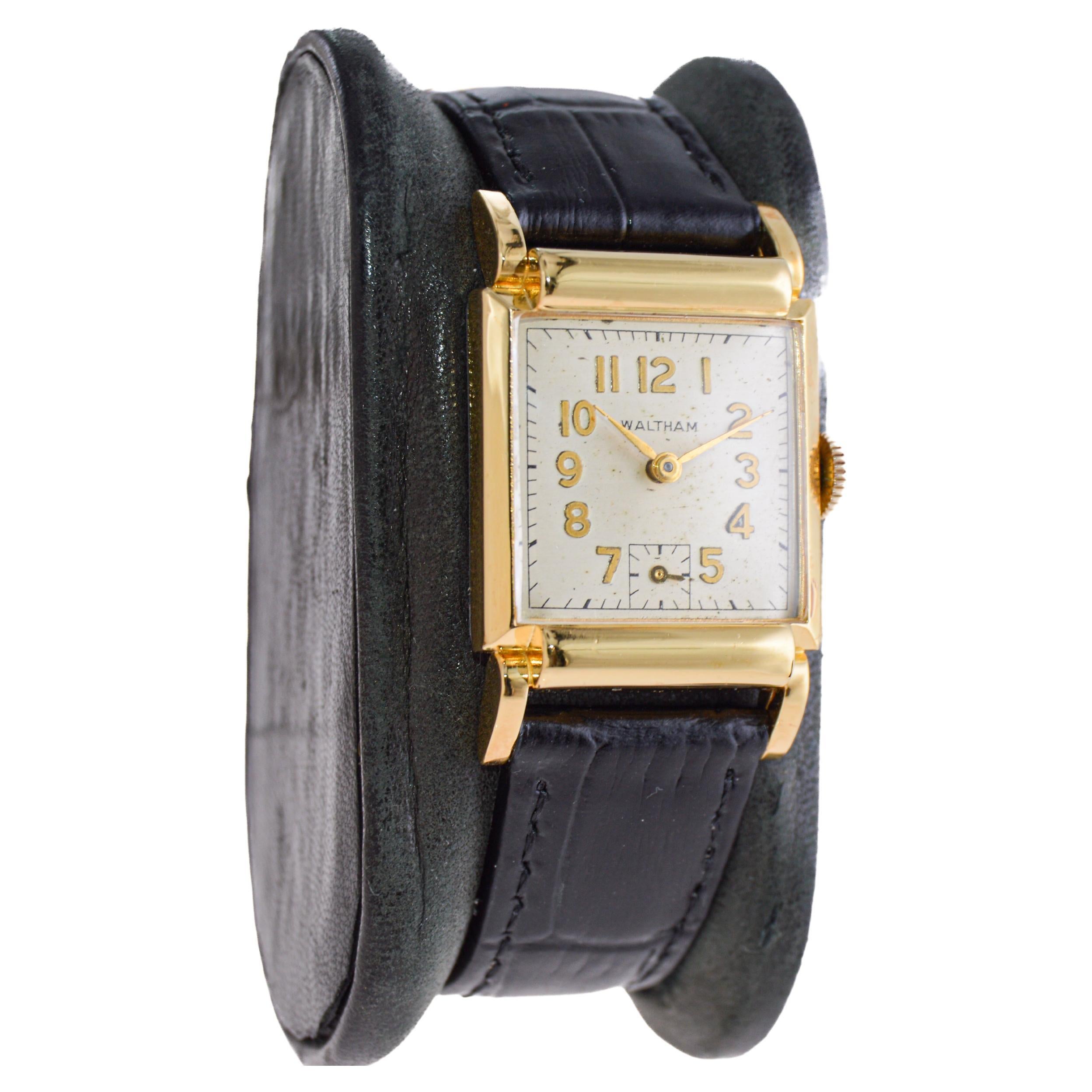 FACTORY / HOUSE: Waltham Watch Company
STYLE / REFERENCE: Art Deco / Tank Style
METAL / MATERIAL: Yellow Gold-Filled
CIRCA / YEAR: 1940's
DIMENSIONS / SIZE: Length 36mm X Width 23mm
MOVEMENT / CALIBER: Manual Winding / 19 Jewels / Caliber 750
DIAL /