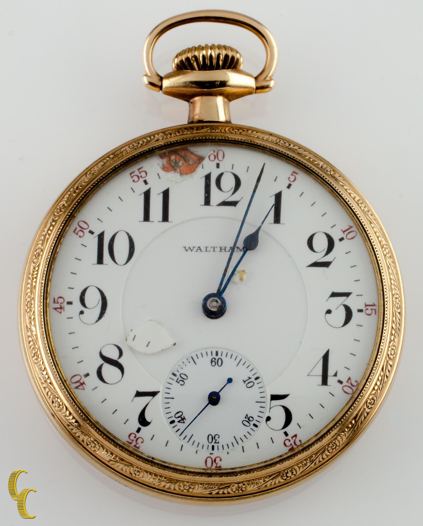 Beautiful Antique Waltham Pocket Watch w/ White Dial Including Cobalt Blue Hands & Dedicated Second Dial
14k Yellow Gold Filled Case Case w/ Intricate Engraved Design on Reverse of Case
Black Arabic Numerals
Case Serial #6417667
23-Jewel Waltham
