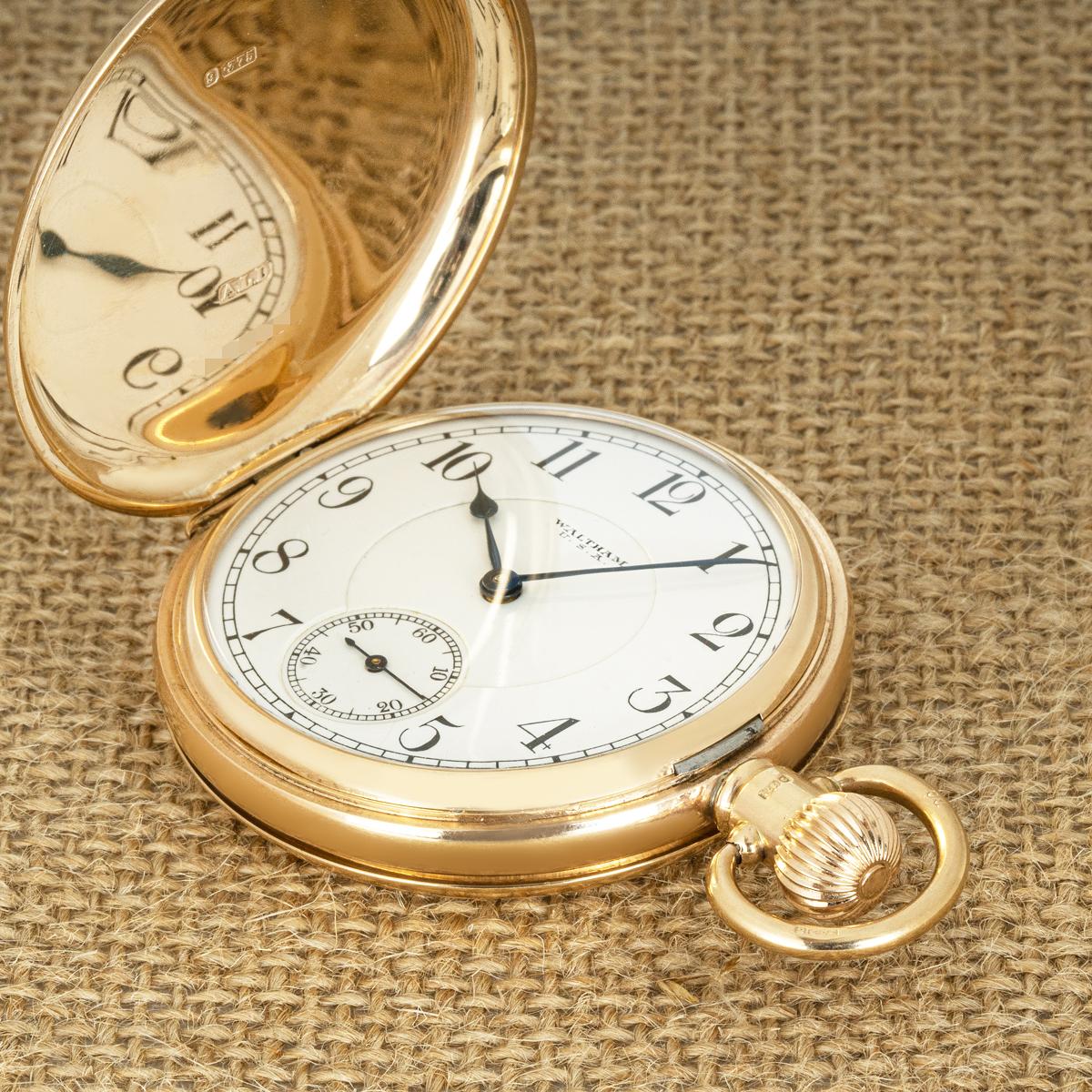 Waltham Riverside. A 9ct Gold Keyless Lever Hunter Pocket Watch C1930s

Dial: The perfect Arabic Numeral white enamel dial signed Waltham USA with subsidiary seconds dial and matching blued steel spade hands.

Case: The plain 9ct rose gold English