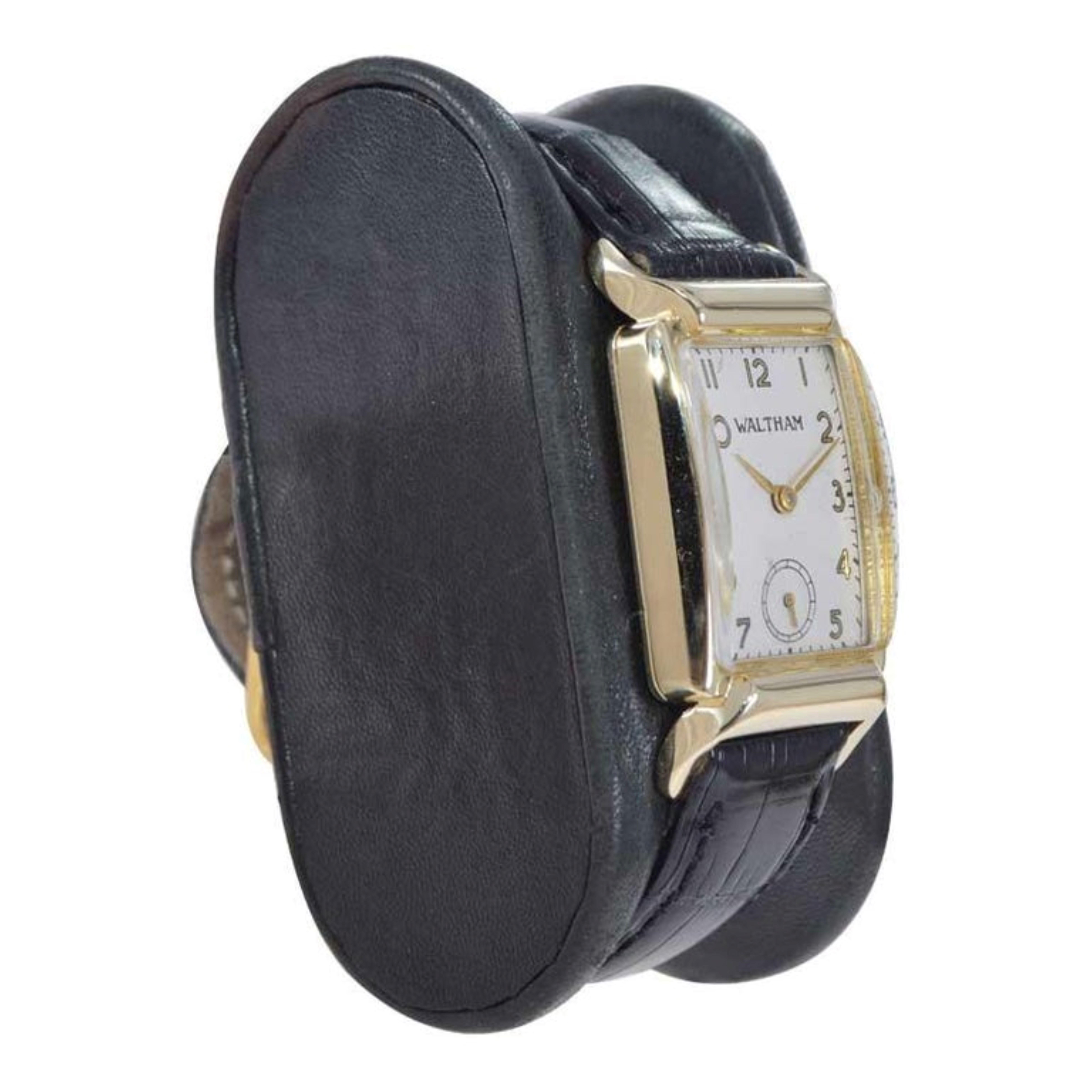 FACTORY / HOUSE: Waltham Watch Company
STYLE / REFERENCE: Art Deco / Tank Style
METAL / MATERIAL: 14Kt Solid Gold 
CIRCA / YEAR: 1940's
DIMENSIONS / SIZE: Length 38mm x Width 21mm
MOVEMENT / CALIBER: Manual Winding / 19 Jewels / Caliber 7508
DIAL /