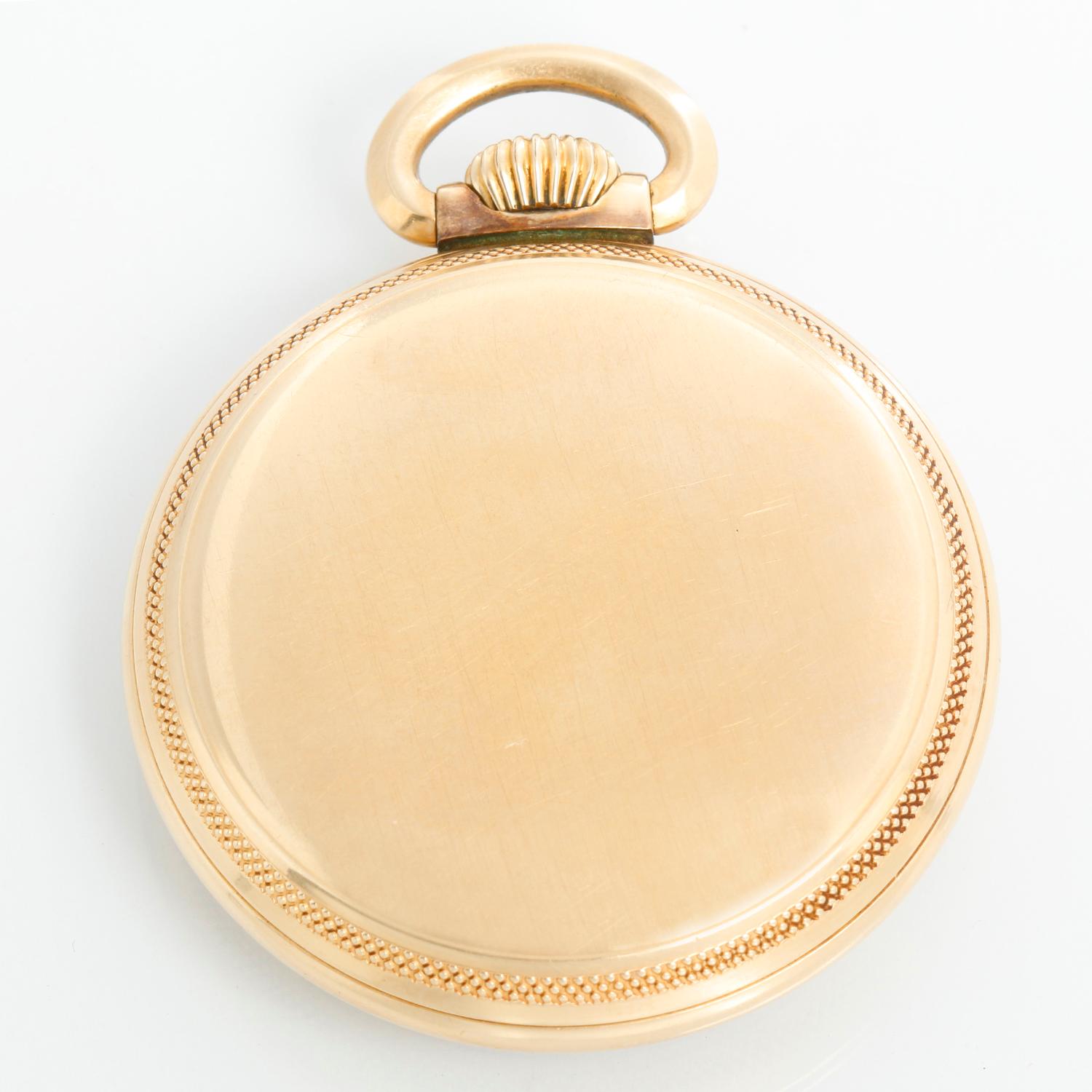 Waltham Vanguard 10K Gold Filled Pocket Watch  - Manual winding; 23 Jewels . 10K Gold filled ( 50 mm ) . White dial with Arabic roman numerals and subdial at 6 o'clock . Pre-owned with custom box.
