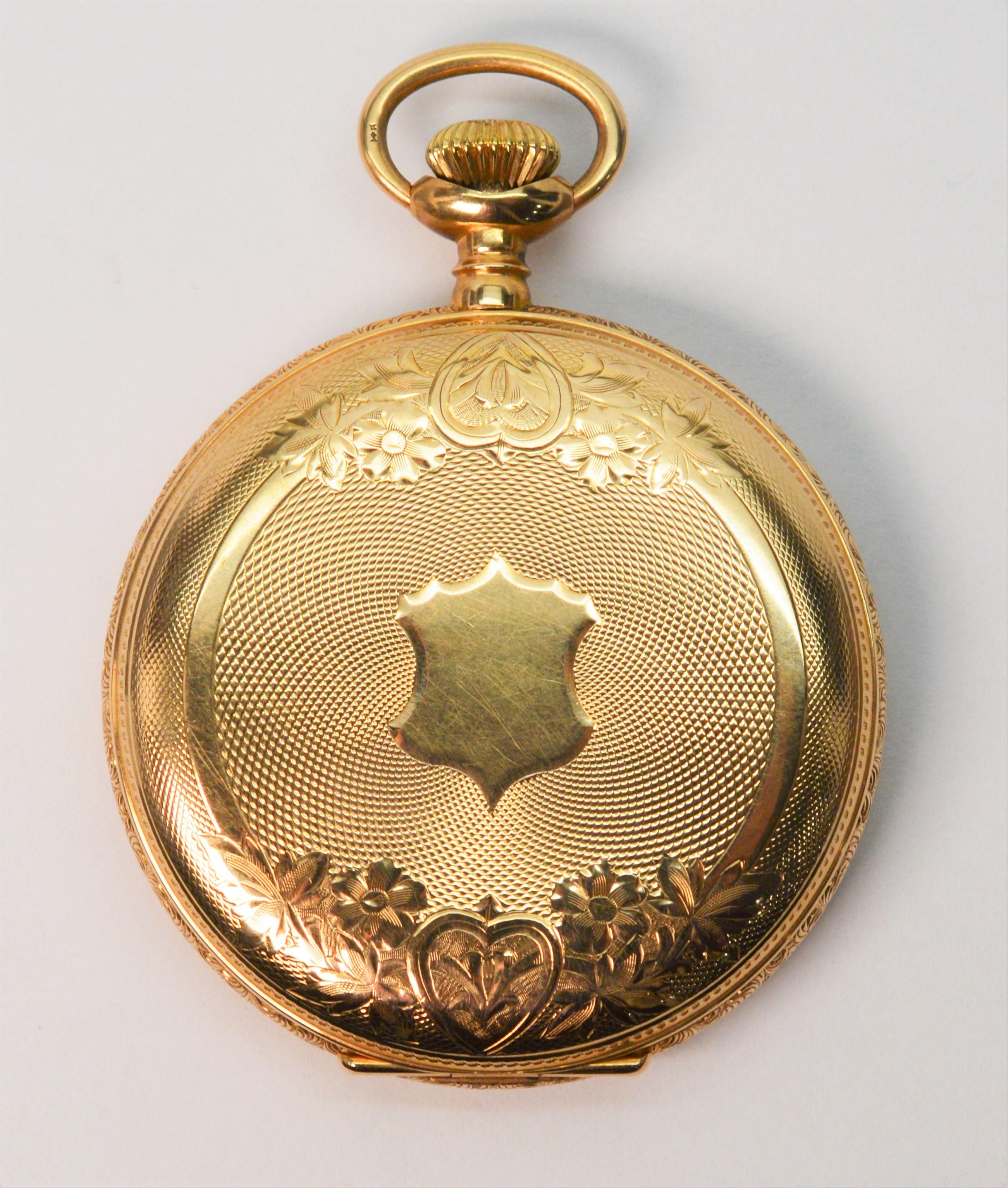 American made by Waltham Watch Co., circa 1908, this handsome pocket watch is a genuine representation of timepieces of it's period. In a fourteen karat 14k yellow gold, this Waltham 47mm pocket watch has a minty 3/4 plate acid etched seven jeweled