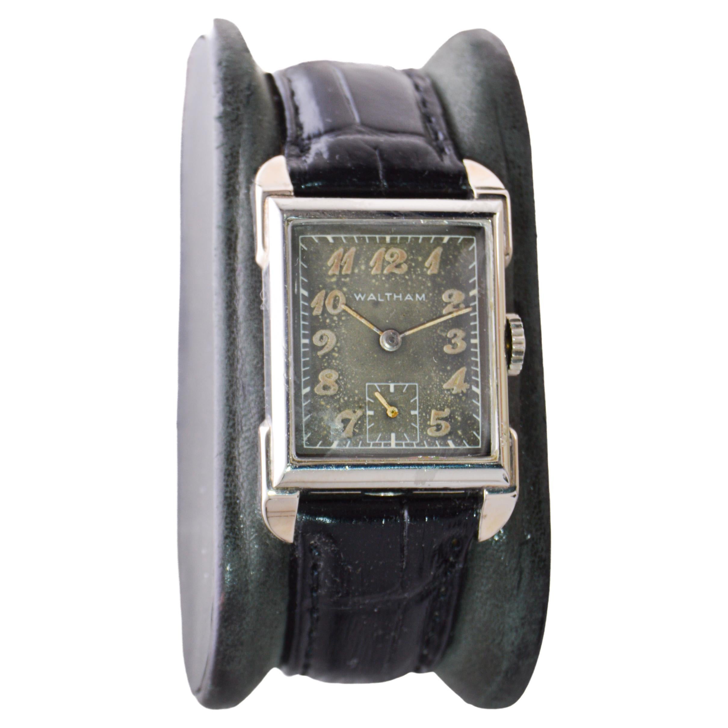 FACTORY / HOUSE: Waltham Watch Company
STYLE / REFERENCE: Art Deco / Tank Style 
METAL / MATERIAL: White Gold Filled
CIRCA / YEAR: 1940's
DIMENSIONS / SIZE: Length 36mm X Width 24mm
MOVEMENT / CALIBER: Manual Winding / 17 Jewel / Caliber 750 B
DIAL