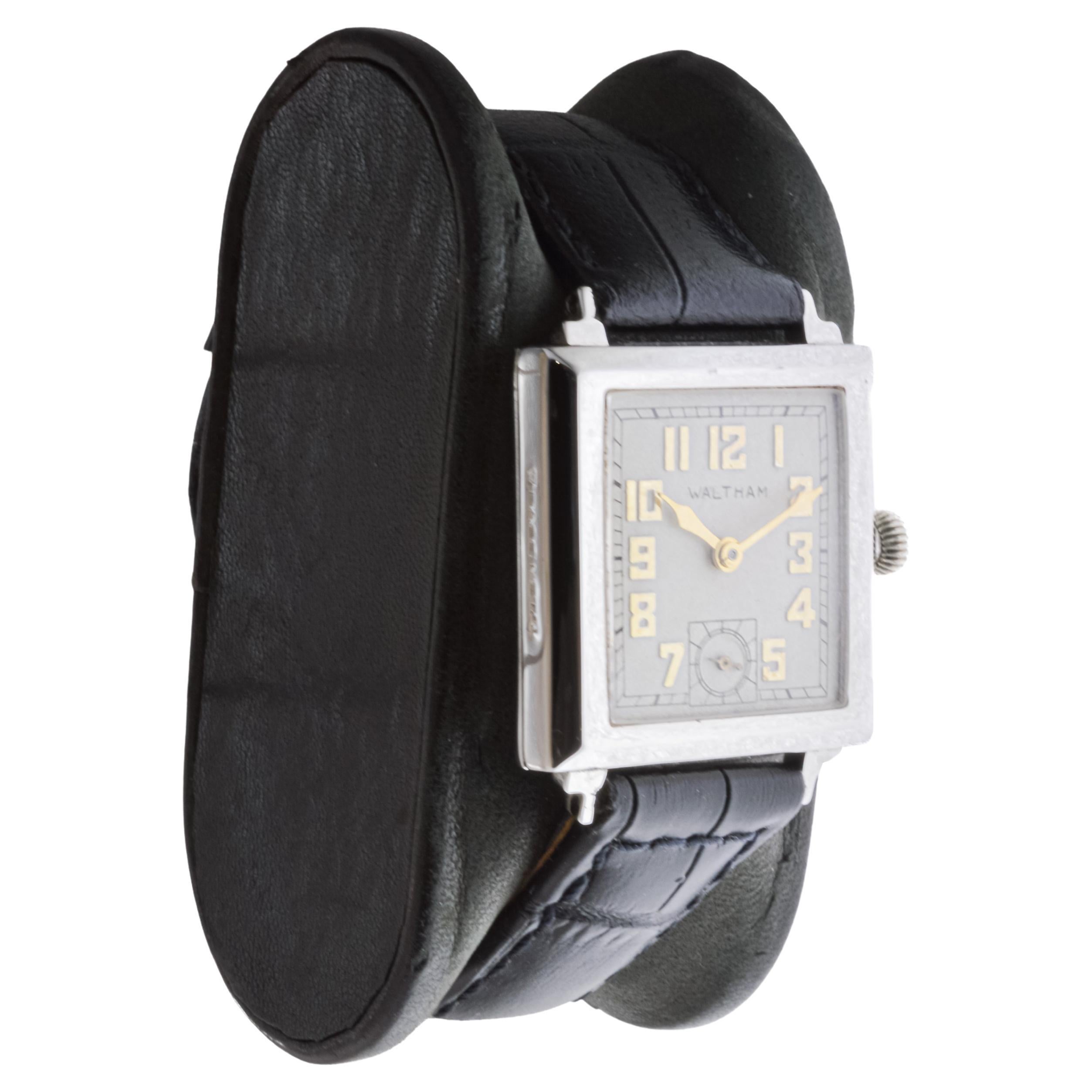 FACTORY / HOUSE: Waltham Watch Company
STYLE / REFERENCE: Art Deco / Tank Style 
METAL / MATERIAL: White Gold Filled 
CIRCA / YEAR: 1934
DIMENSIONS / SIZE: Length 26mm X Width 34mm
MOVEMENT / CALIBER: Manual Winding / 17 Jewels / Caliber 6/0  
DIAL