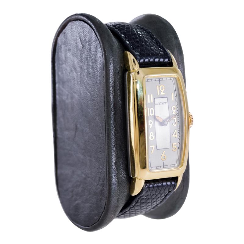 FACTORY / HOUSE: Waltham Watch Company
STYLE / REFERENCE: Art Deco / Tonneau Shape
METAL / MATERIAL: Yellow Gold Filled
CIRCA / YEAR: 1930's
DIMENSIONS / SIZE:  Length 45mm X Width 21mm
MOVEMENT / CALIBER: Manual Winding / 15 Jewels 
DIAL / HANDS: