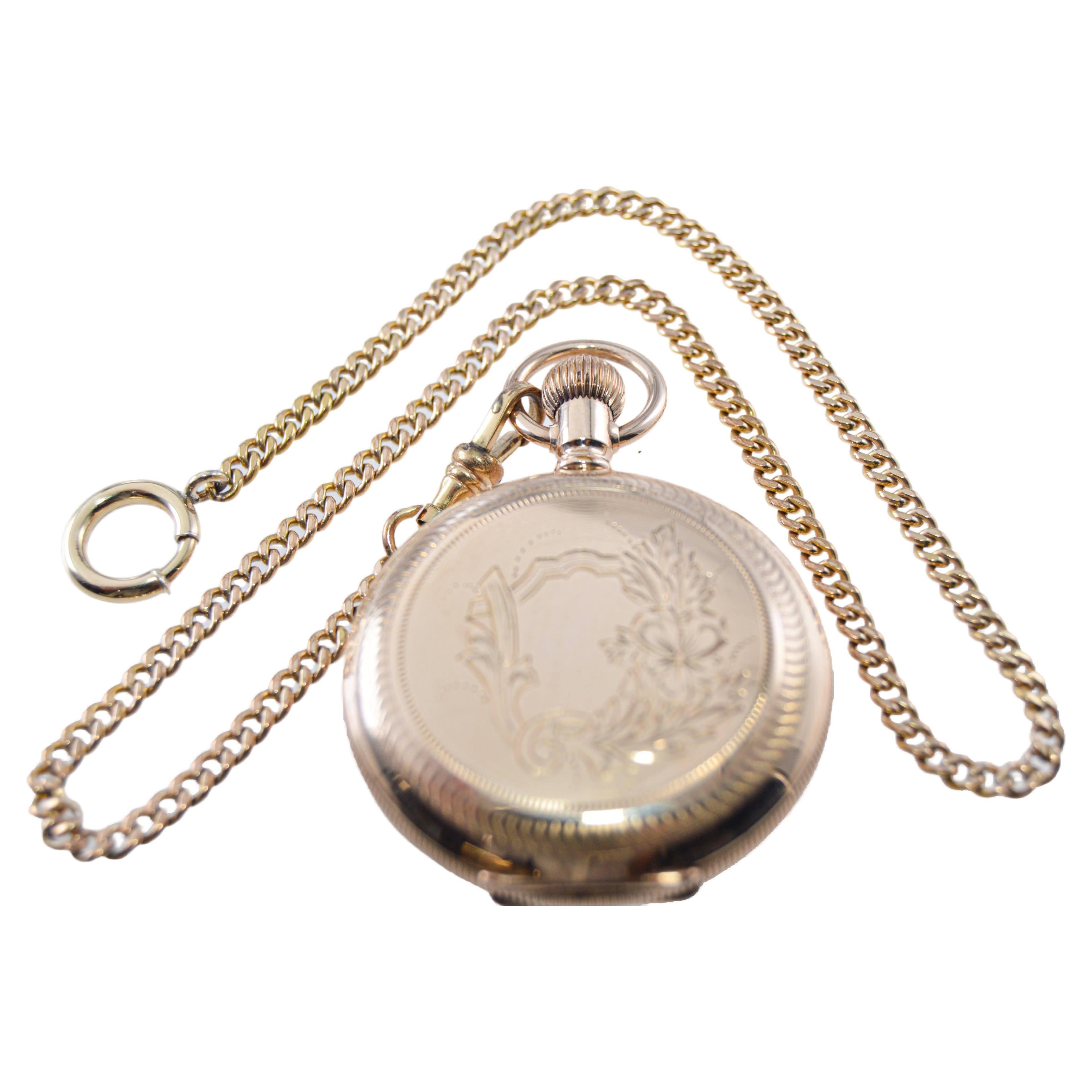 FACTORY / HOUSE: Waltham Watch Company
STYLE / REFERENCE: Hunters Case Pendant Style / Hand Engraved 
METAL / MATERIAL: Yellow Gold Filled
CIRCA / YEAR: 1893
DIMENSIONS / SIZE: Diameter 42mm 
MOVEMENT / CALIBER: Manual Winding / 6 Size
DIAL / HANDS: