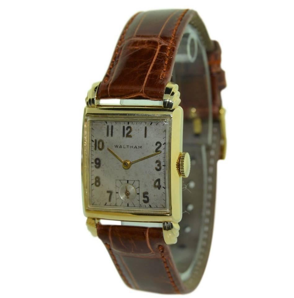 FACTORY / HOUSE: Waltham Watch Company
STYLE / REFERENCE: Art Deco / Tank Style
METAL / MATERIAL: 14Kt. Yellow Gold Filled
CIRCA: 1940
DIMENSIONS: 37mm X 24mm
MOVEMENT / CALIBER: Winding / 27 Jewels / Cal. 750
DIAL / HANDS: Original Dial with Arabic